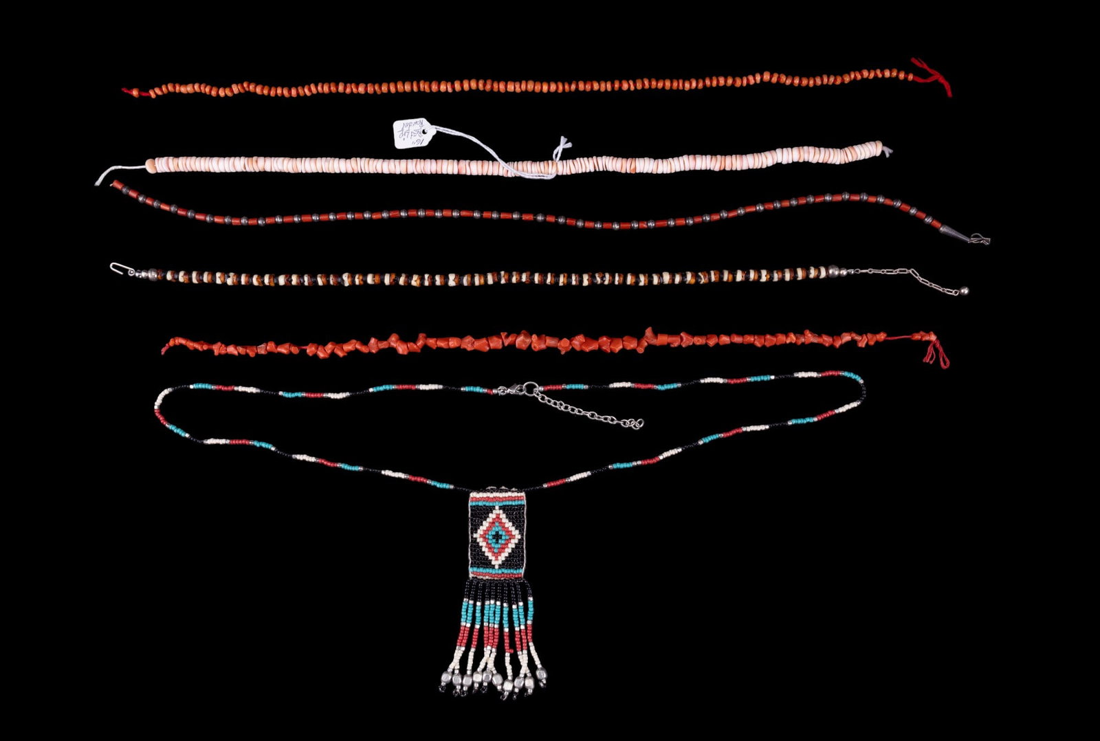 Turquoise and Native American Coral Necklaces: Includes a pink coral and red coral necklace one with silver hand made beads, and turquoise and Shell delicate bead necklaces