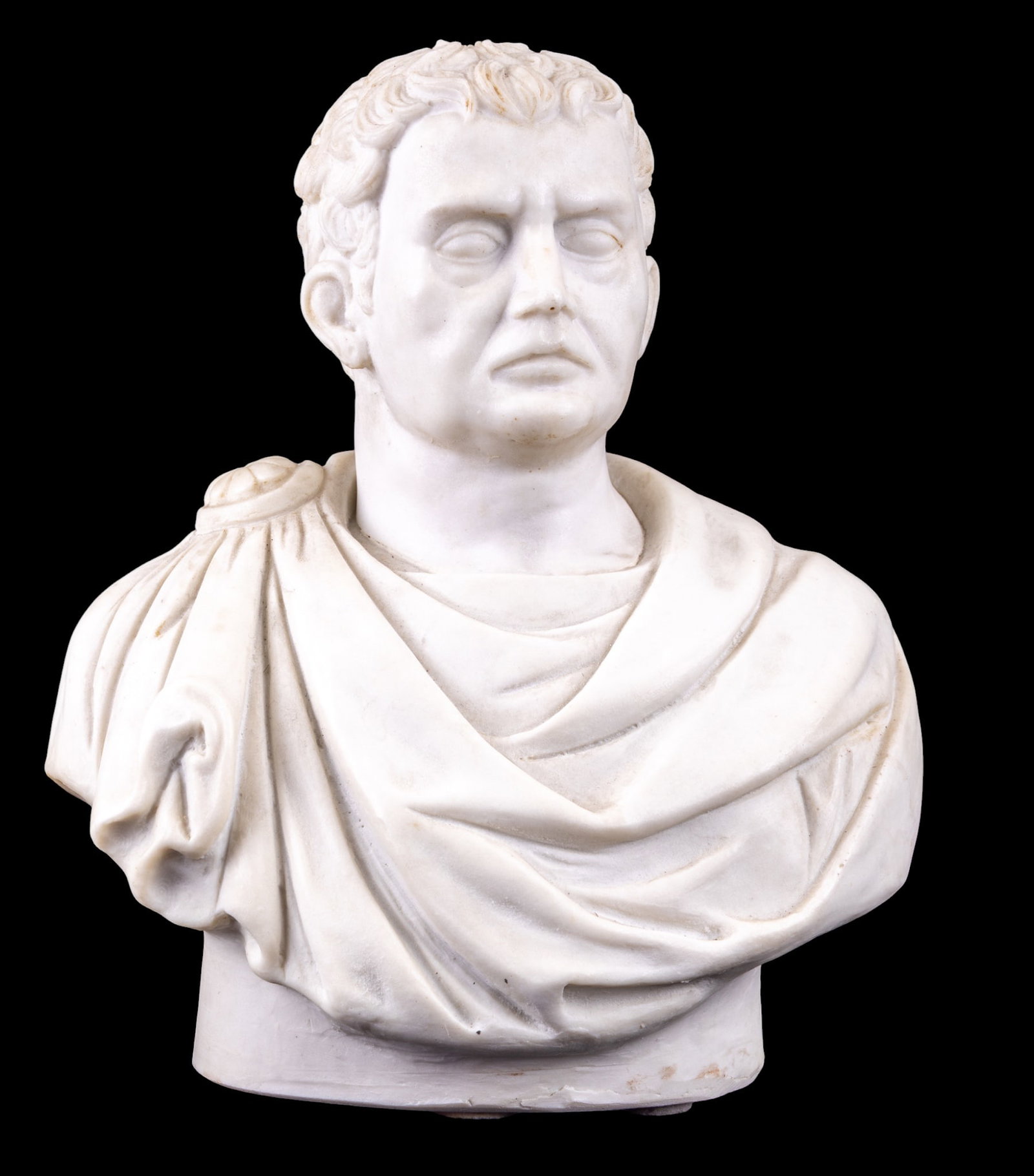 Small Bust of Brutus: Composite bust depicting Brutus, shown with short curled hair, draped toga, and a stern classical expression. Measures approx. 9.5" and weighs approx. 9.7 lbs possibly molded concrete with nice finish