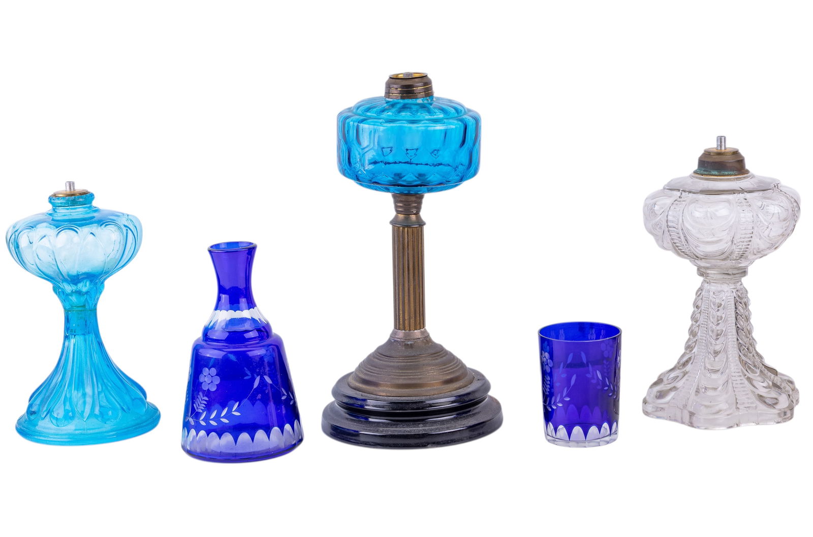 Boston & Sandwich Fluid Lamps & Tumbler: Group of antique and vintage glass items including 3 fluid lamps, one clear pressed example and two in aqua blue (attributed to Boston & Sandwich Glass Company), together with a cobalt blue cut-to-cle
