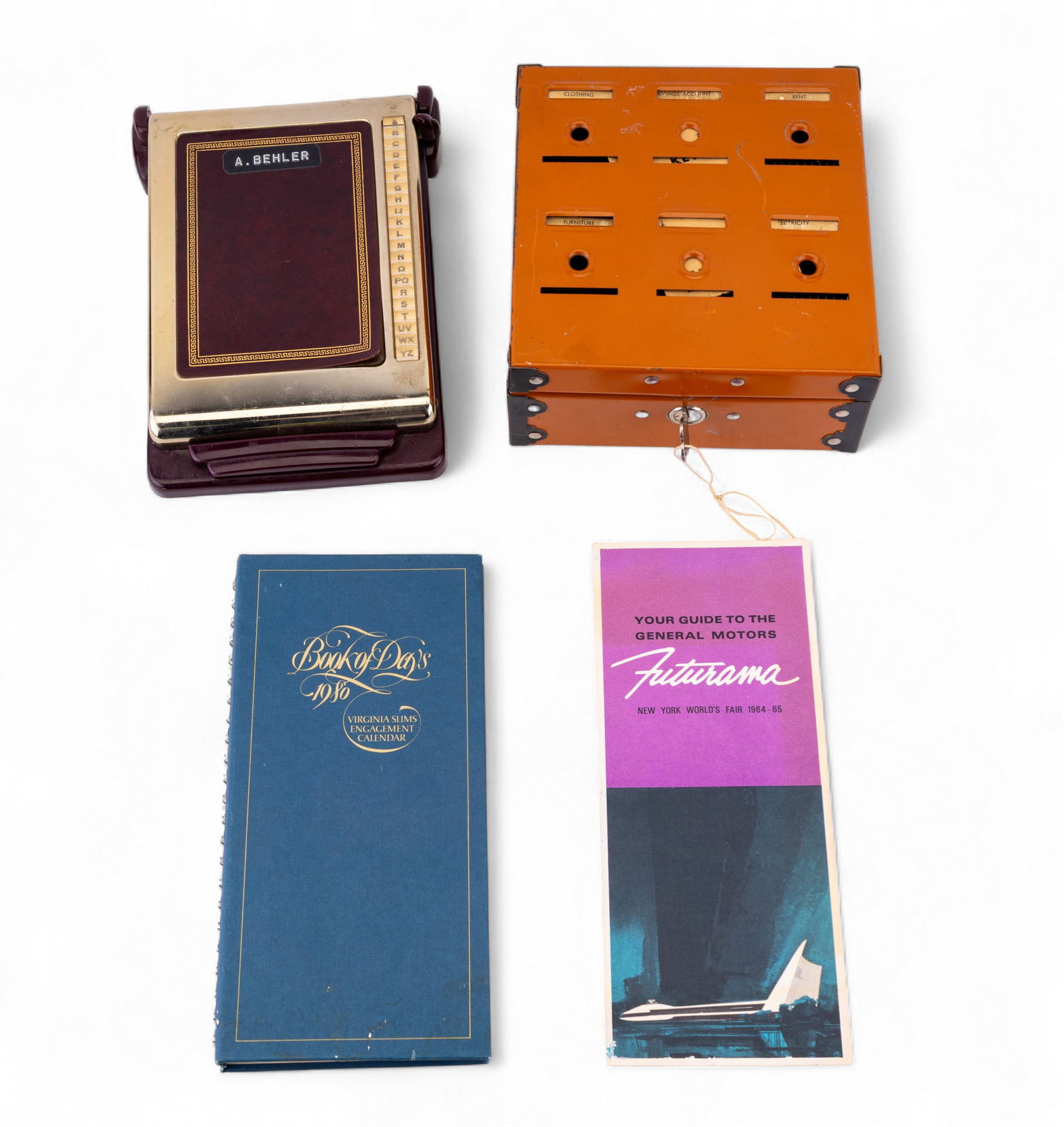 Vintage Tudor Budget Bank and Ephemera: Includes a mid-century Tudor Metal Products Co. "Budget Bank" with 6 individual labeled compartments (Clothing, Savings Account, Rent, Furniture, etc) and original key envelope; a 1980 Virginia Slims