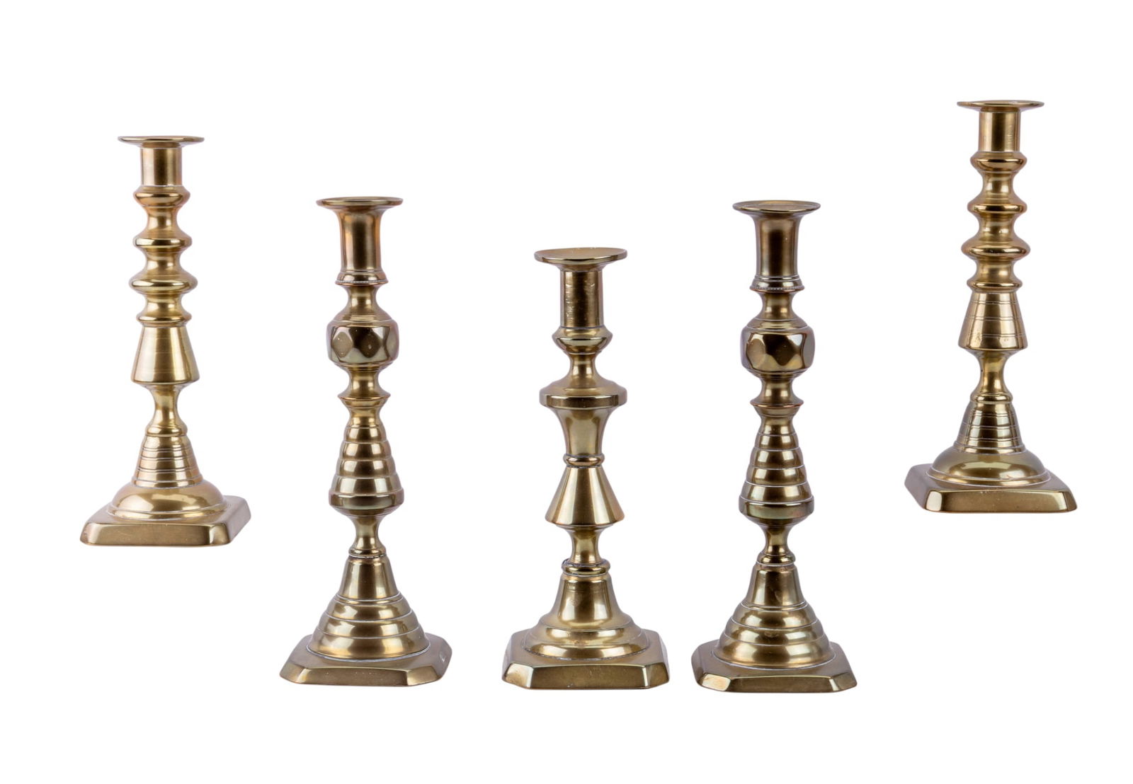 19C Brass Candlesticks w/ Beehive: 2 pairs of 19th century, beehive brass candlesticks and 1 single candlestick without pair. Taller candlesticks each measure approx. 11" each.