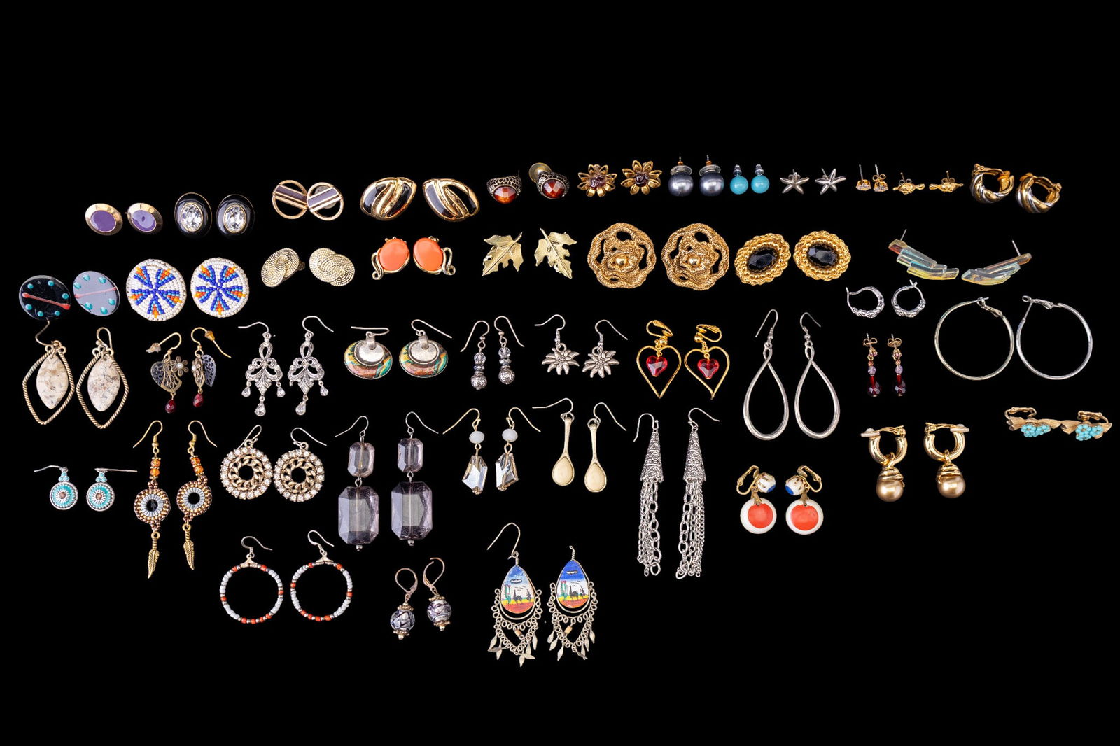 Coro and Other Costume Earrings: A collection of costume earrings featuring gold tone and faux turquoise Coro clip on earrings, Native American style glass bead disc stud earrings, gold tone, rhinestones, and other clip on and pierce