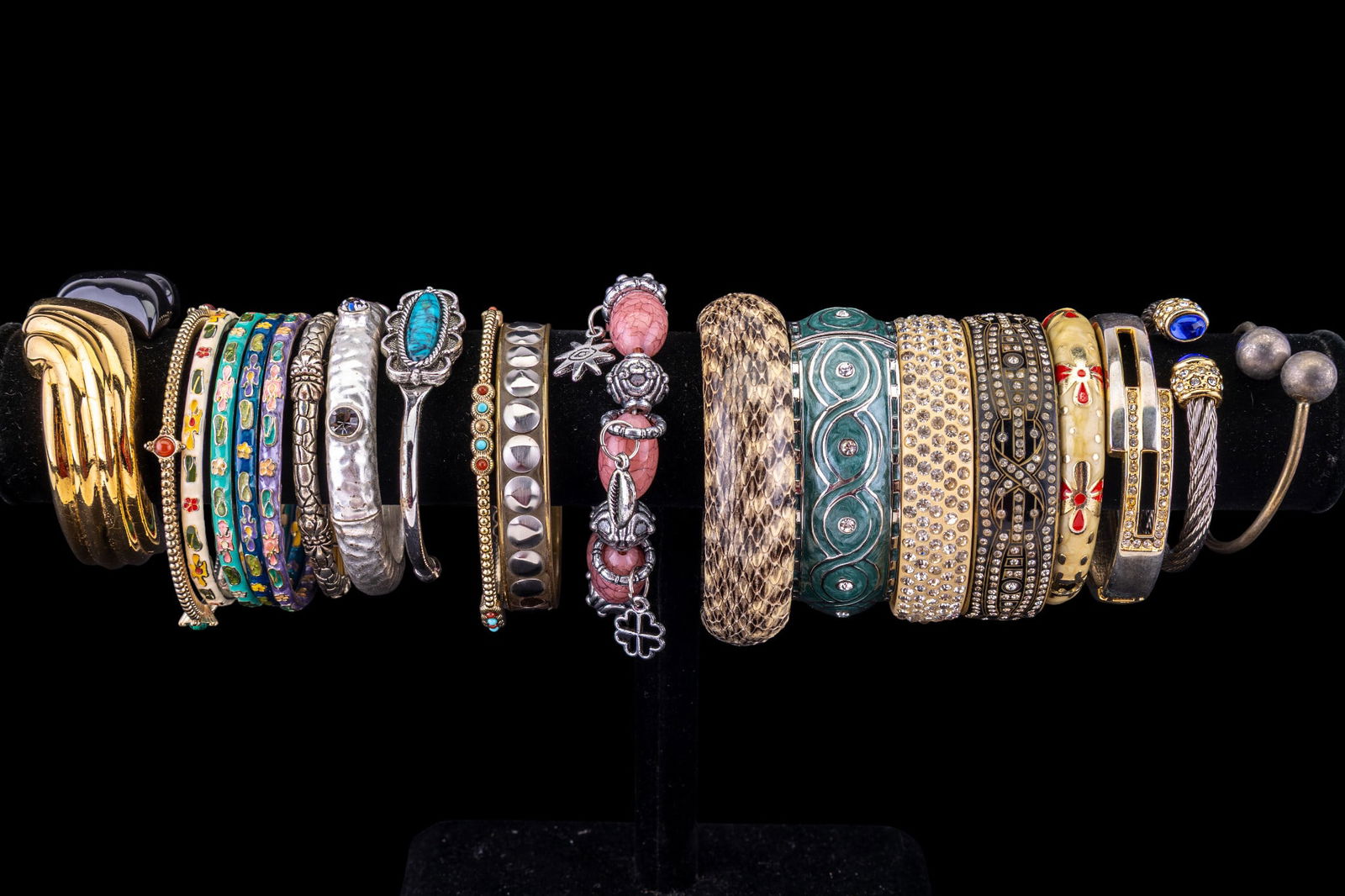 Bangle and Cuff Bracelets: A collection of vintage bangle and cuff bracelets featuring a set of very pretty enamel cloisonne style bangles, hinged bangles, and others.