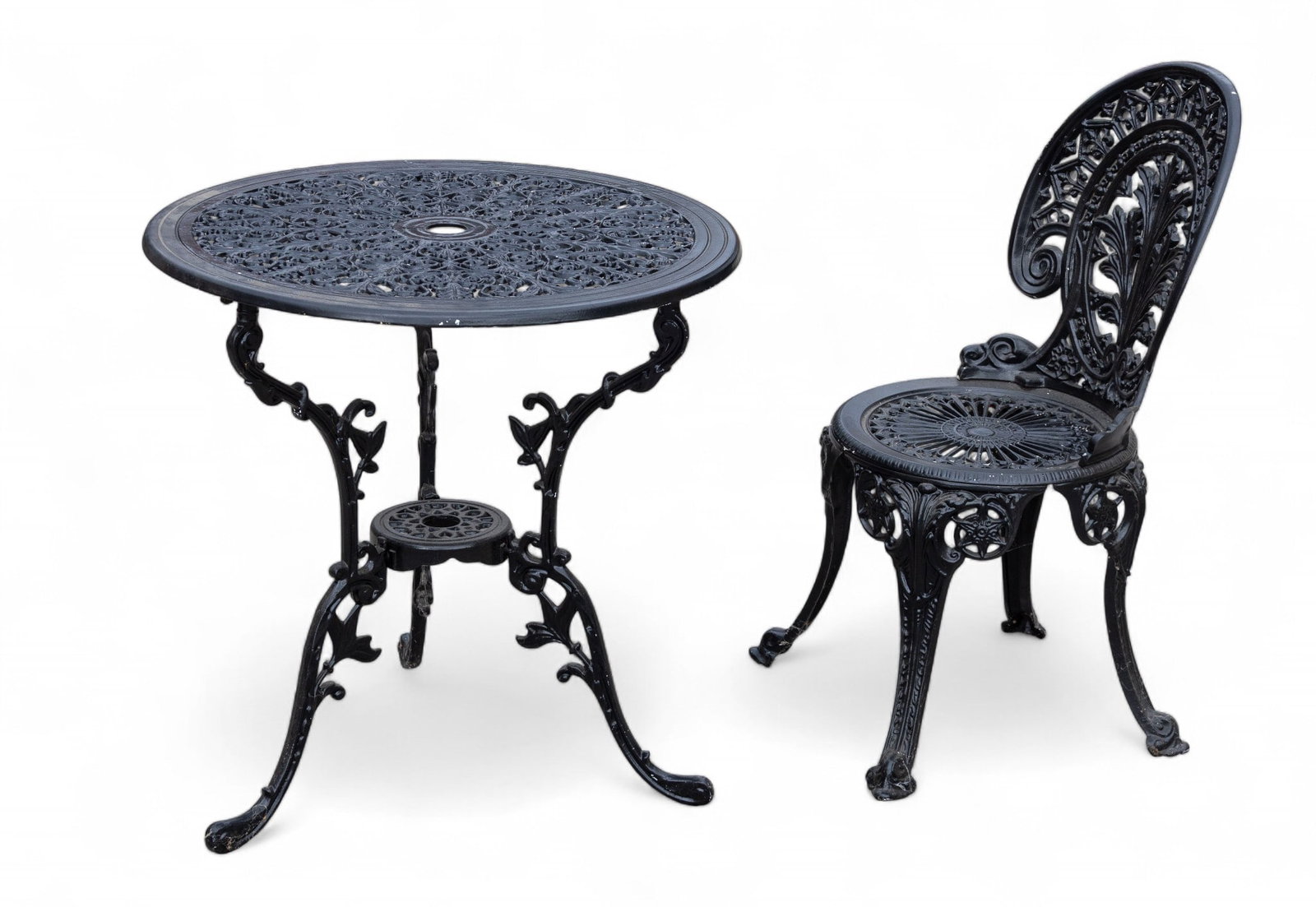 Cast Metal Chair, Table: Cast metal patio chair and table. Table measures approx. 28" H x 27" diameter. Seat measures approx. 34" H x 17" seat height x 14" W.