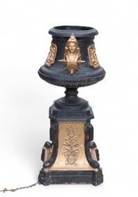 Cast Metal Figural Gardener w/ Roman Motif