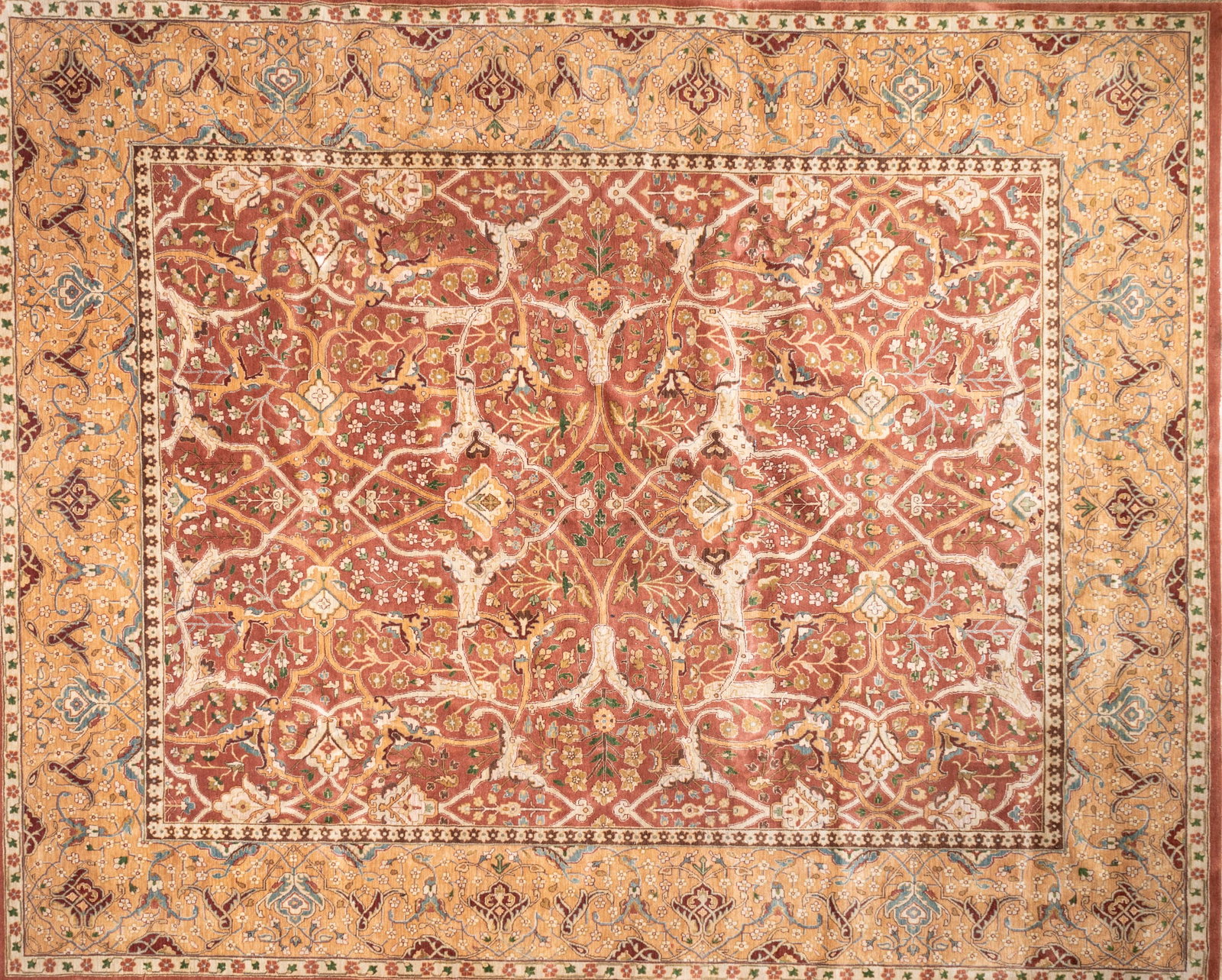 Hand Knotted Rug: Hand-knotted rug with iron red field and floral motif border. Measuring approx. 9'10" x 8'.