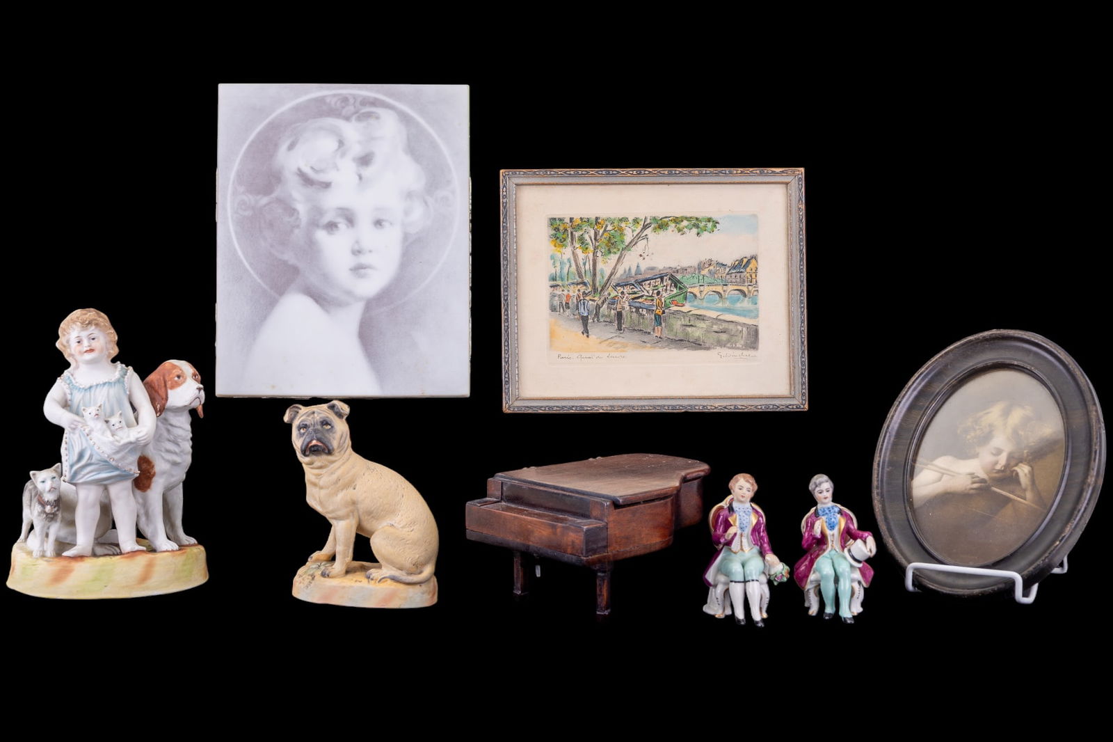 Decorative and Porcelain Collectibles: Lot includes porcelain seated pug figure, oval portrait of a young girl, small piano shaped jewelry box lined with red felt, framed watercolor of a street scene of Paris (signed), a porcelain plaque d