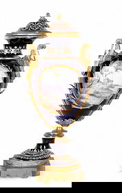 Pater Signed Large Revolving Sevres Vase: A monumental / palace sized Sevres porcelain revolving vase with lid, decorated in cobalt ground and elaborate raised gilt scrollwork. Features gilt metal mounts, stork-form handles, and finely hand-p