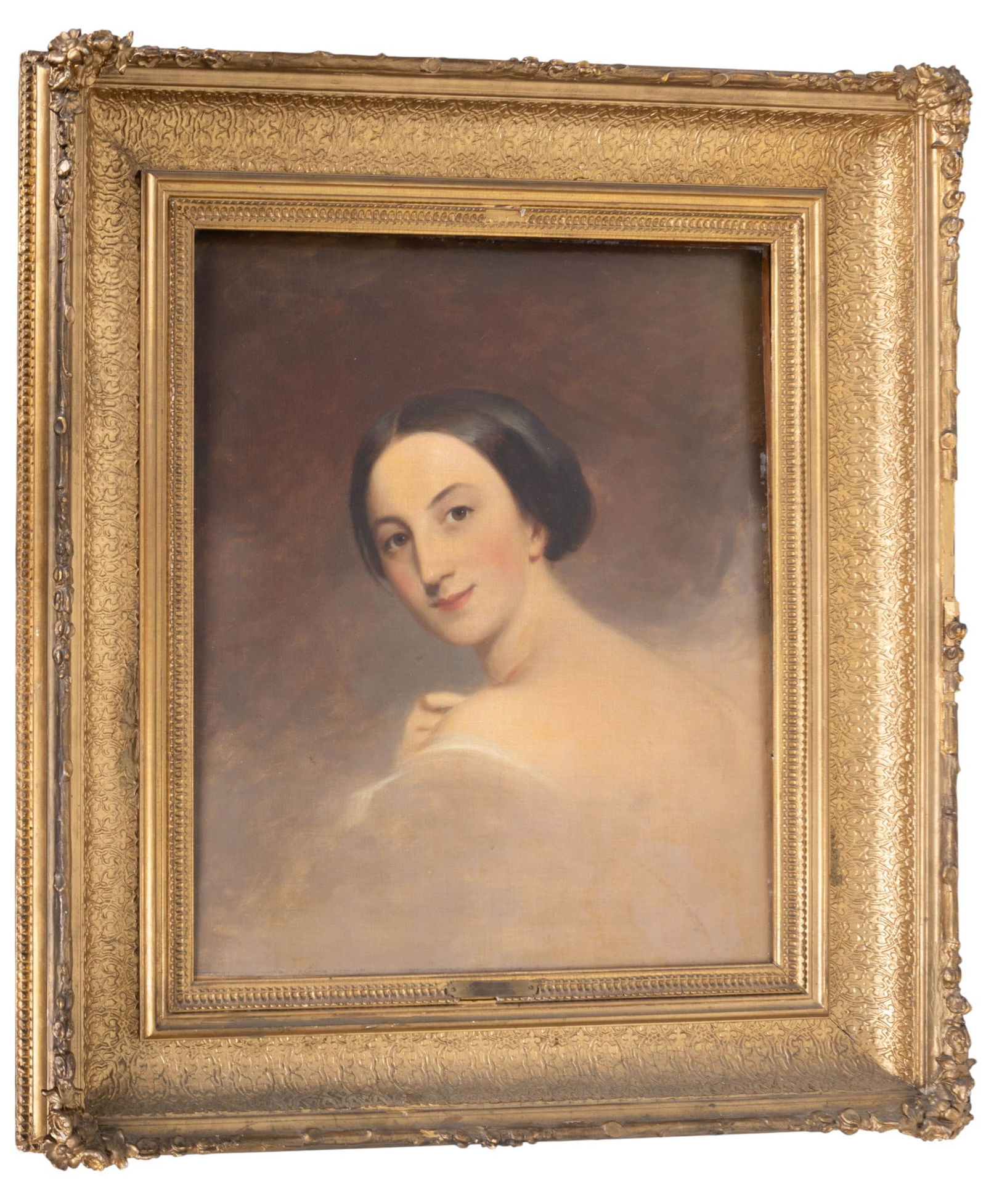 Portrait of Woman attr Thomas Sully (1783-1872): Oil on canvas attributed to Thomas Sully (1783-1872), portrait depicts a young with dark hair and white gown, turned in three-quarter view against a dark background. Housed in ornate giltwood frame wi