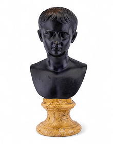 Bronze Bust of Caesar Augustus on Marble Base: Finely cast bronze bust depicting Caesar Augustus with dark patinated surface mounted on a turned yellow marble socle base. Measures approx. 24" H x 11" W. Weighs approx. 38.4 lbs.
