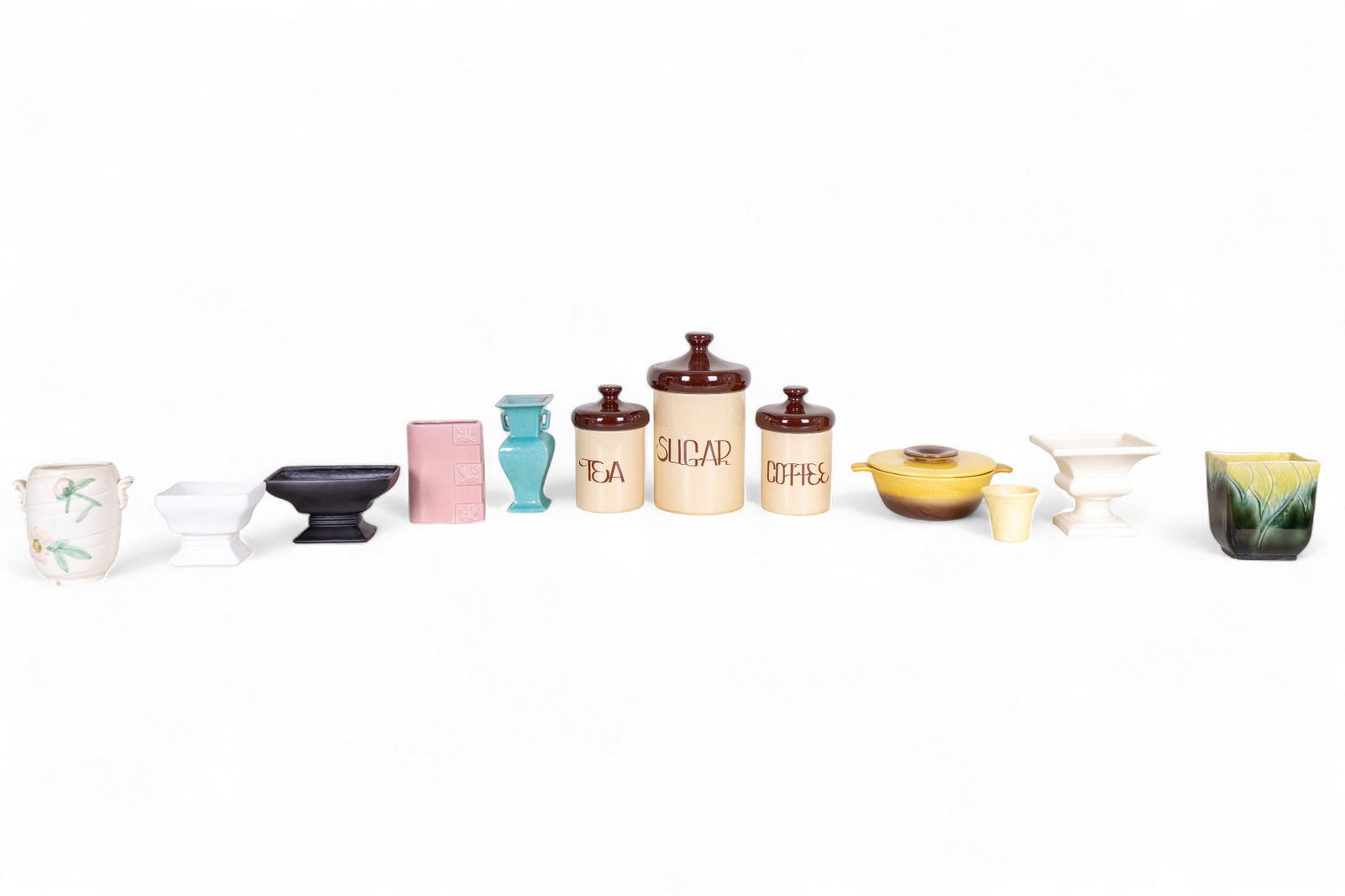 Weller Pottery and Other Pottery Collection: Large assortment of branded and unbranded pottery pieces, including kitchen canister 3 pc set (sugar, coffee, and tea), Gonder teal vase, Weller white floral beehive-form vase, McCoy black centerpiece