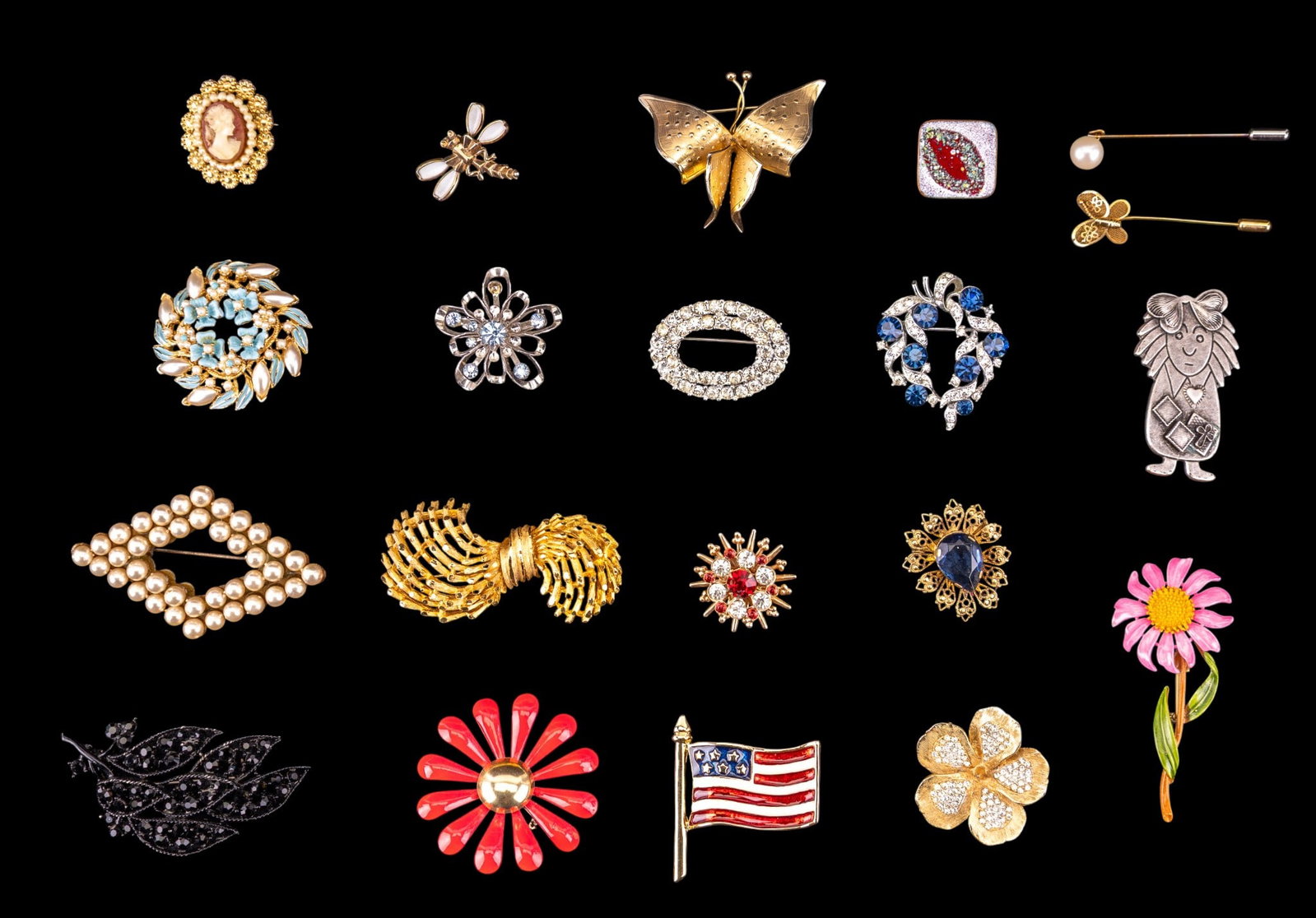 Vintage Brooches, Pins: 20 vintage brooches and pins with various forms and examples including: 2 brooches marked "Lisnor"; dragonfly pin; one example marked "BSK"; American flag brooch, and others.
