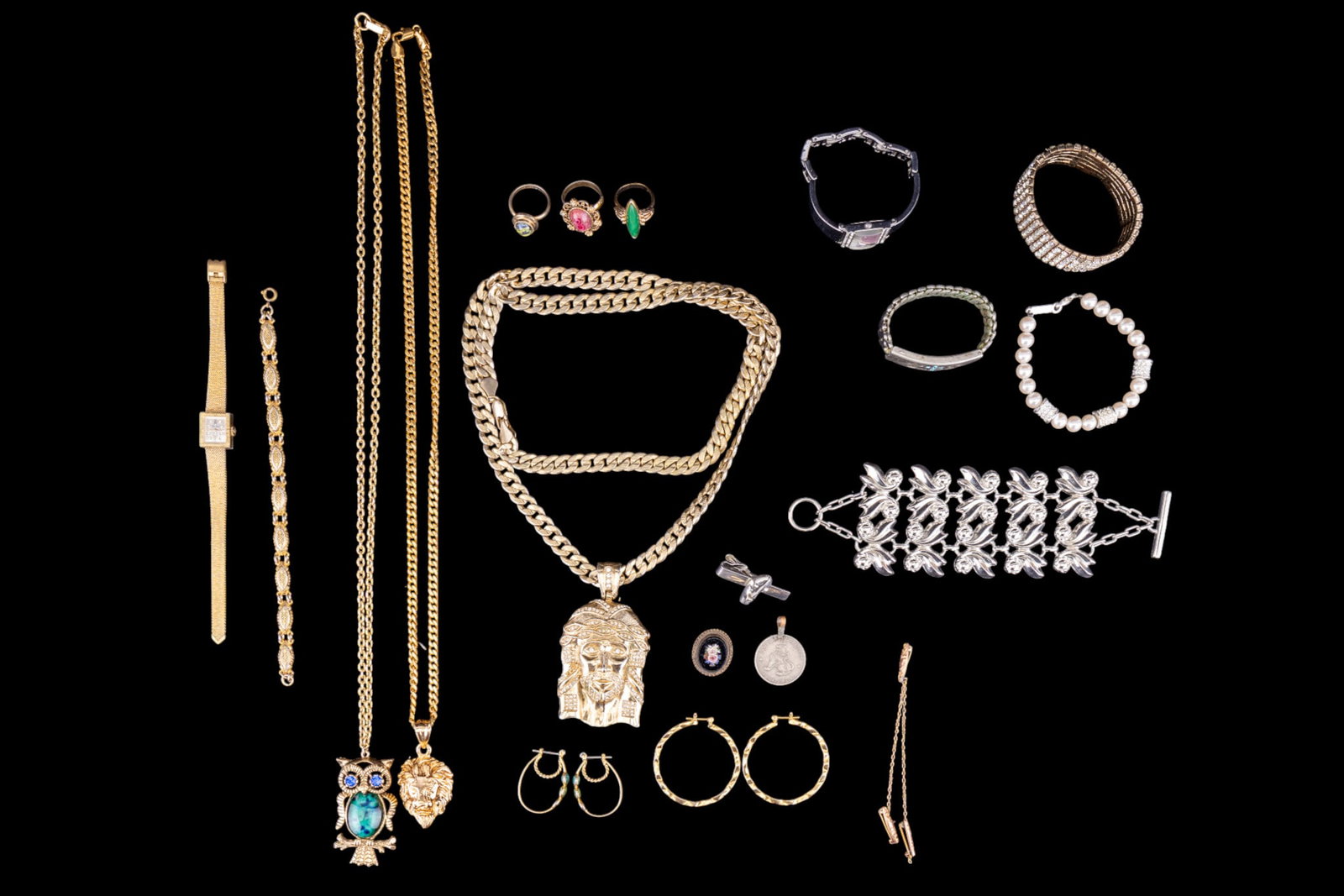 Large Collection of Vintage Jewelry: Includes large Jesus pendant necklace, pearl jewelry, rhinestone bracelet, lion necklace, and more.