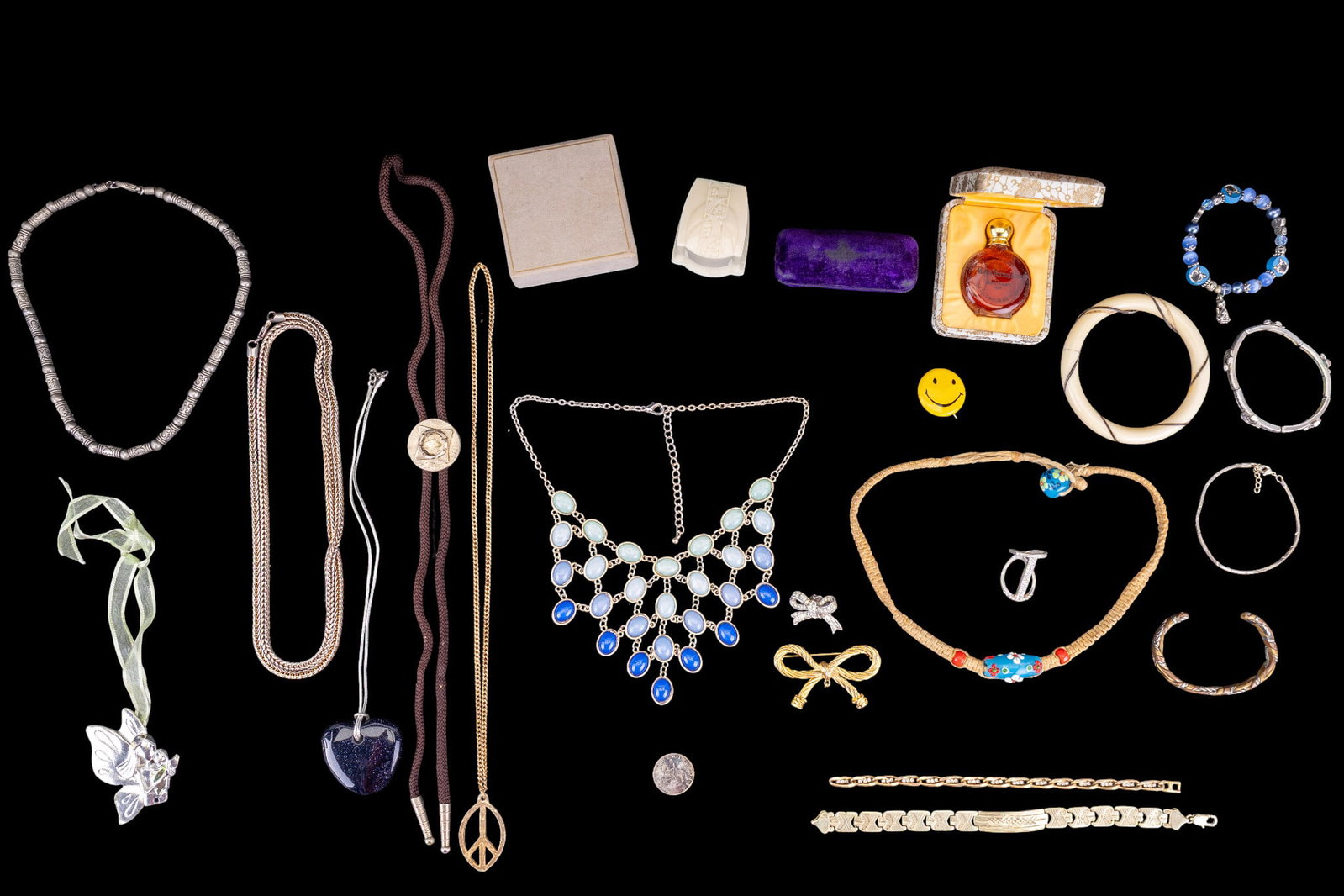 Variety of Costume Jewelry: Includes gold and silver-tone jewelry, boxed jewelry, bangle, pins, and other pieces.
