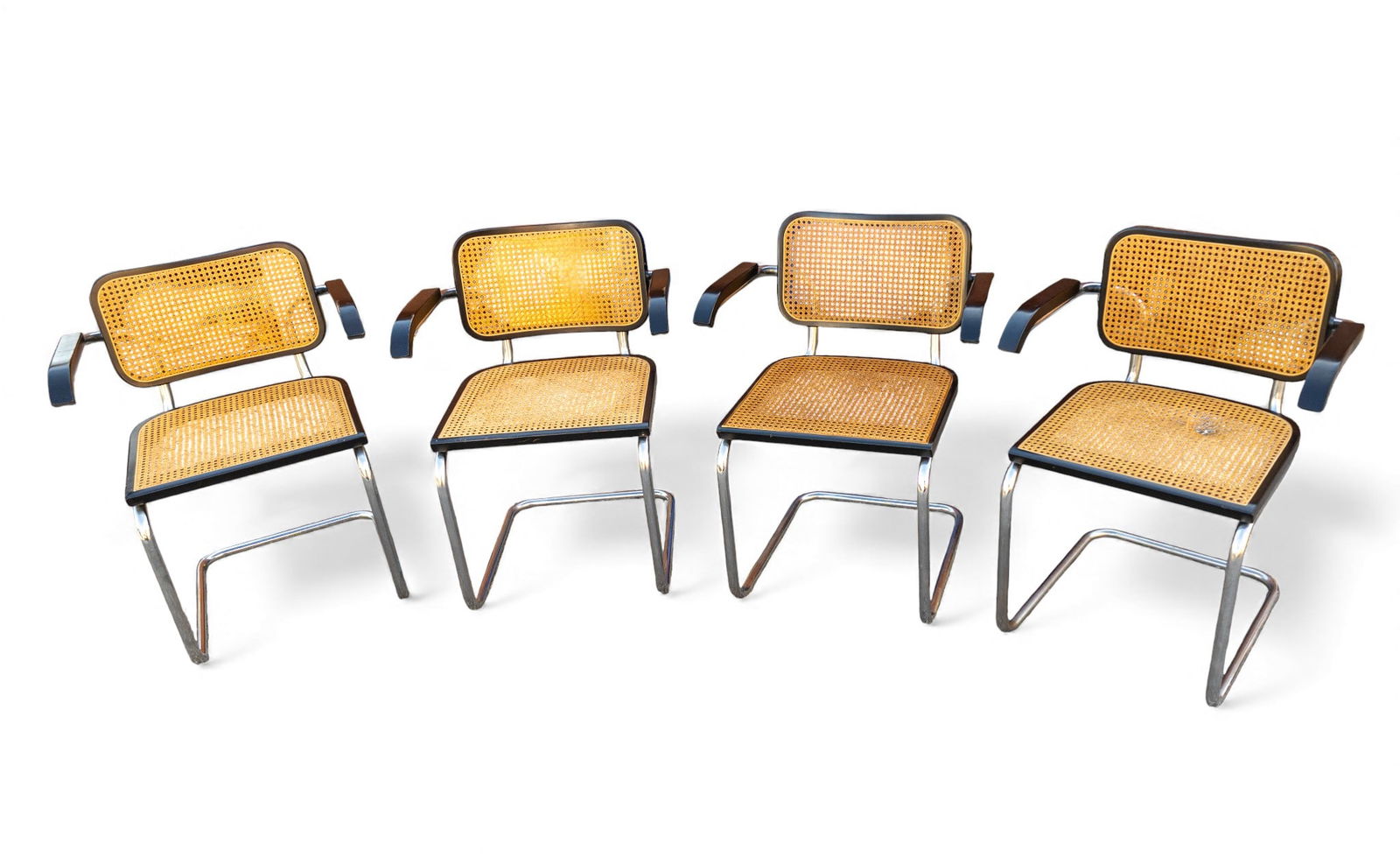 MCM Breuer Design Cane and Chrome Armchairs (4): Cesca-Style Dining Chair, chrome frame with cane seat and back. Mid-century Modern / vintage armchairs, made in Italy. Each measures approx. 31" H x 23.5" W x 18" D. Similar to / after Marcel Breuer C