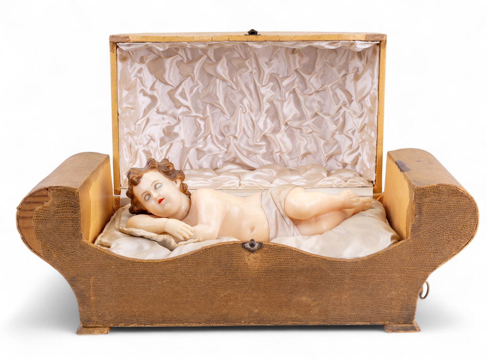 Early European Automaton Wax Baby Jesus Music Box: Early European automaton wax baby Jesus music box. Wind up and music is functional, and movement of baby is in working condition. Note some loss and repair to left rounded edge of the casket. Measures