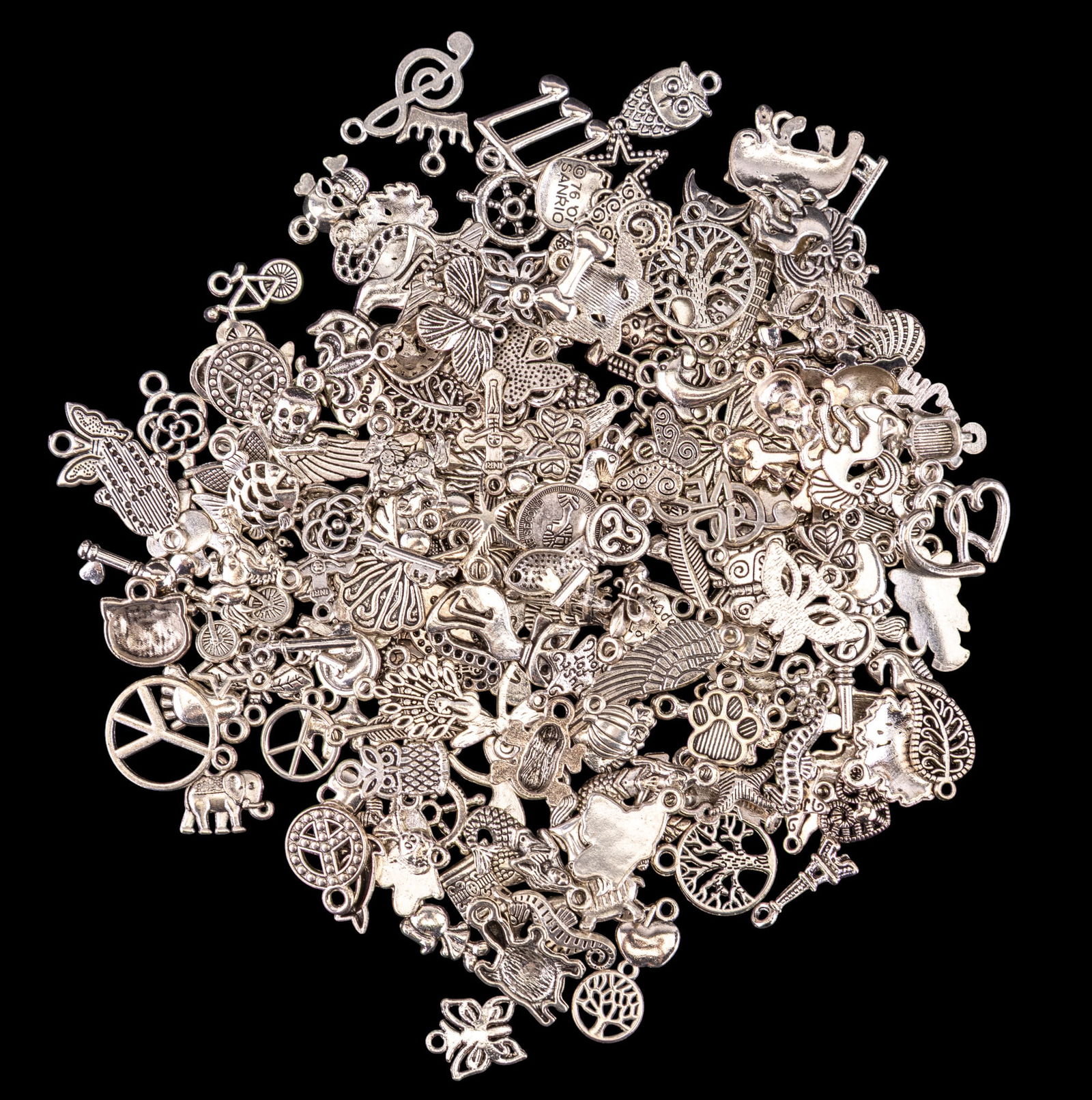 Silver Tone Charms: Large assortment of silver tone jewelry charms in various styles including turtles, peace signs, horses, guitars, and more.