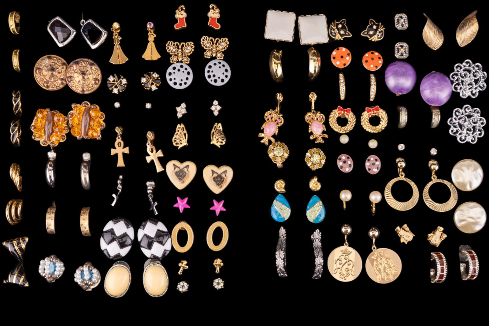 Costume Earring Collection, Various Styles: Large collection of approx. (53) pairs of vintage stud, clip on, and screw back costume earrings featuring design elements such as rhinestones, enamel inlay, hoops, button, figural / cats, butterfly, 