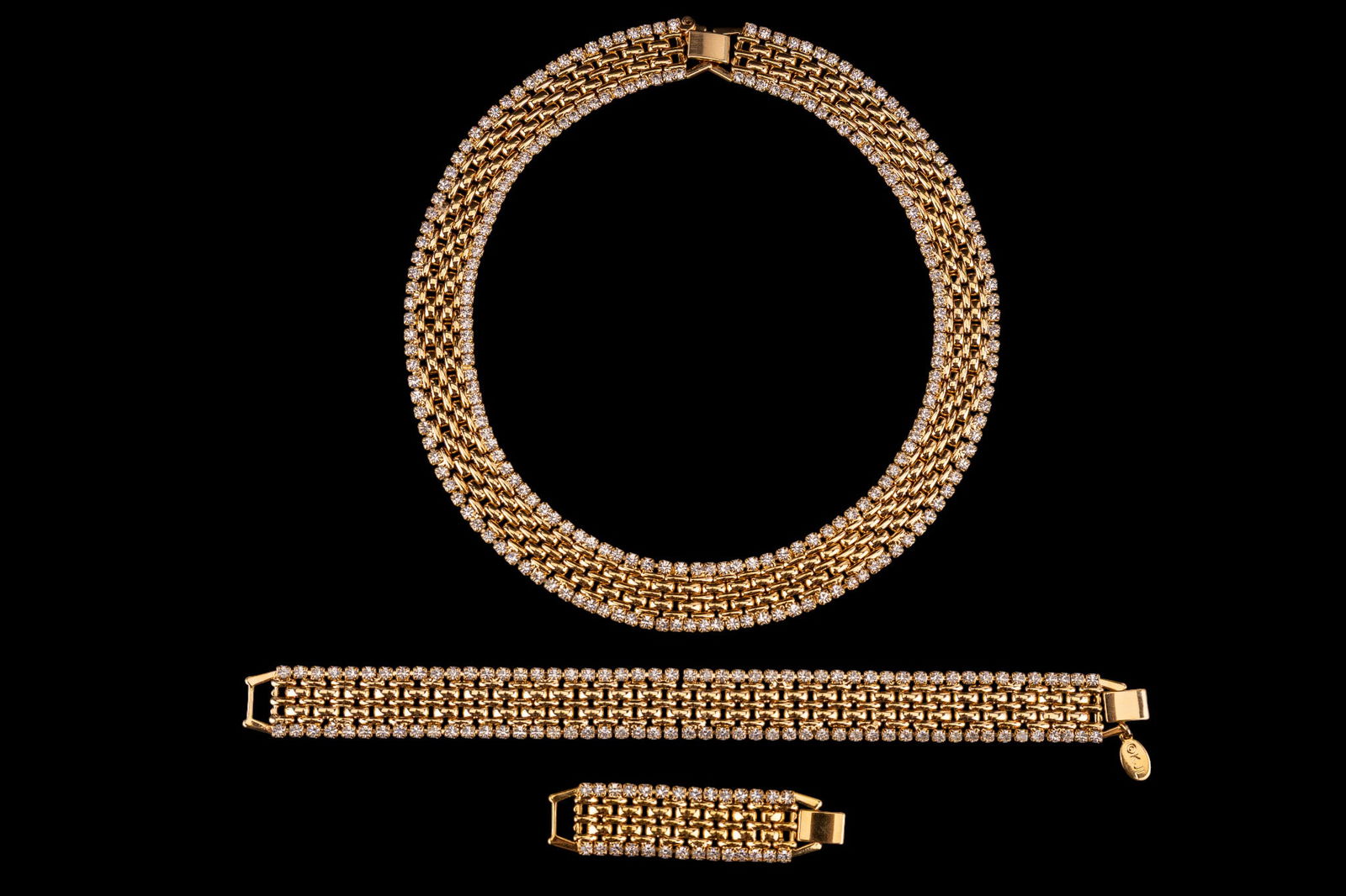 Kenneth Jay Lane Necklace Set: Gold tone and crystal pave necklace and bracelet, with a piece to lengthen the necklace.