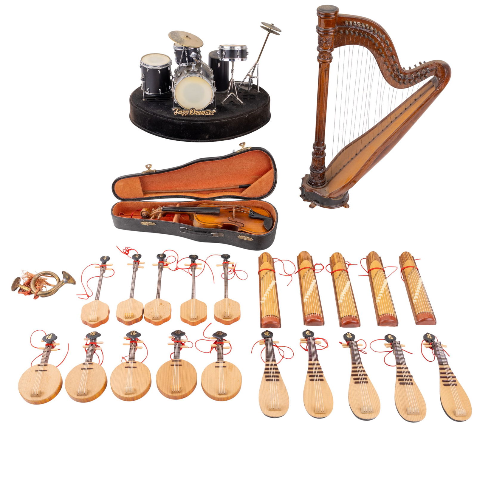 Miniature Musical Instruments and Ornaments: A collection of miniature musical instruments including a stand up harp, measuring approx. 14" H x 8" W, a miniature violin with case and bow, note bow hair missing, a miniature Jazz Drum Set display,