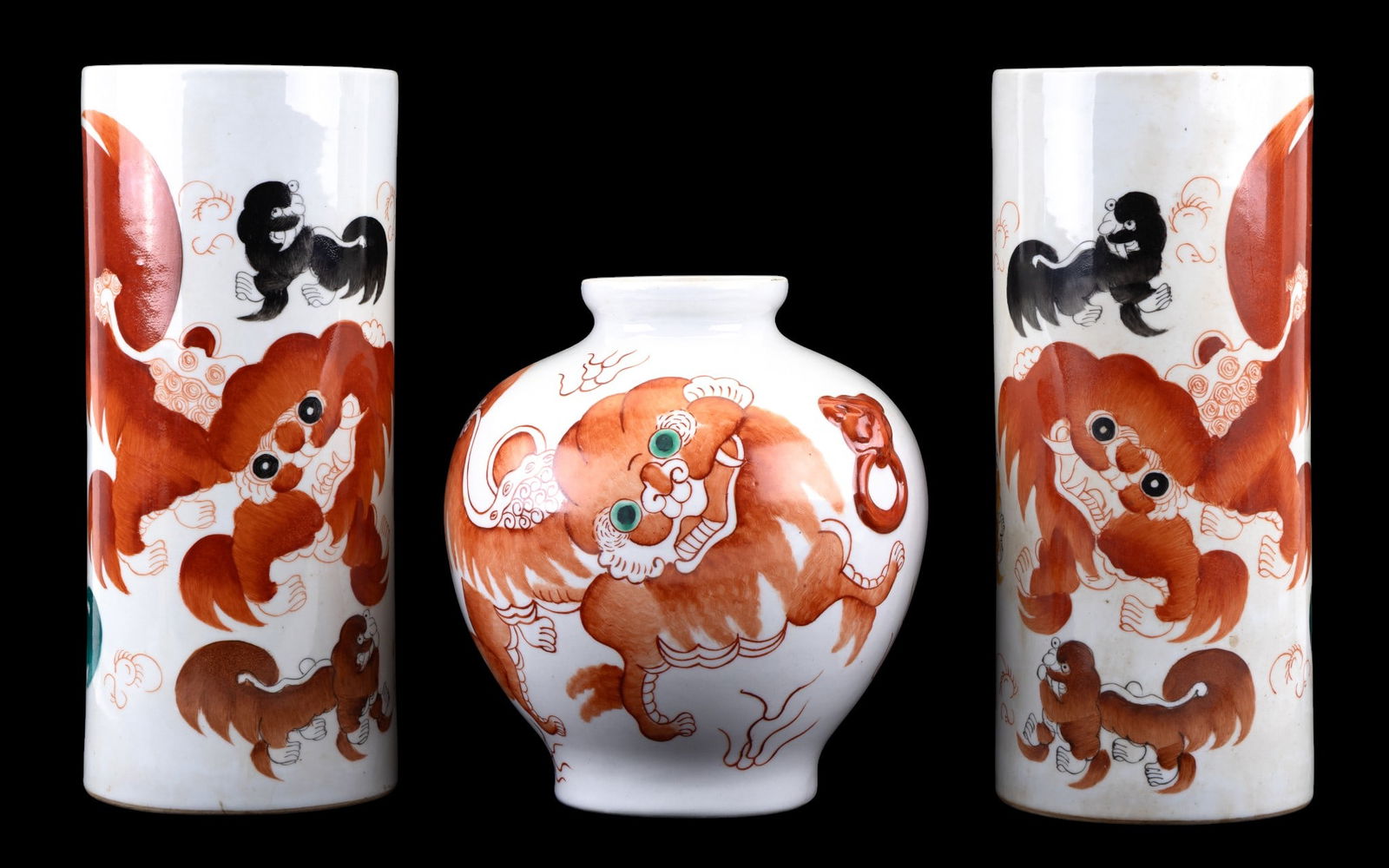 Asian Porcelain (3pc): 3 Asian porcelain pieces, each with hand-painted foo dogs in iron-red, green, and black enamels and each bearing a red character mark on the underside. Includes one bulbous jar with wide mouth decorat