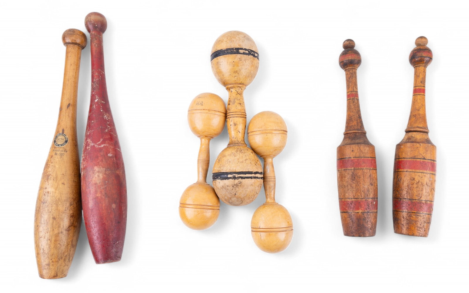 Vintage Wooden Excercise Clubs, Dumbells: Group of vintage wooden excercise clubs, early 20th century. Includes one marked A.G. Spalding & Bros. Class Club No 1302, a red painted club, a pair of striped clubs, a matched pair of Royal 1/2 lb. 