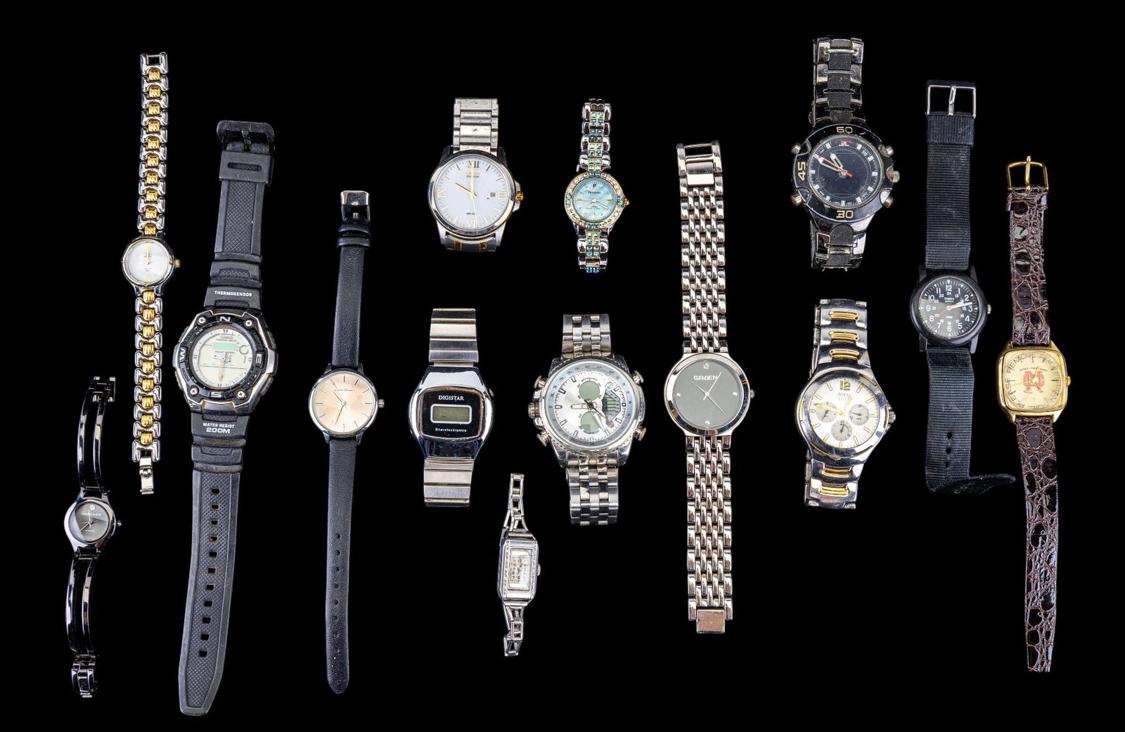 Fourteen Various Wristwatches: To Include Gruen #SR626SW, Casio, Citizen, Guess, a vintage ladies Elgin movement #35499806 in a Keystone Veritas Case #623945, and more