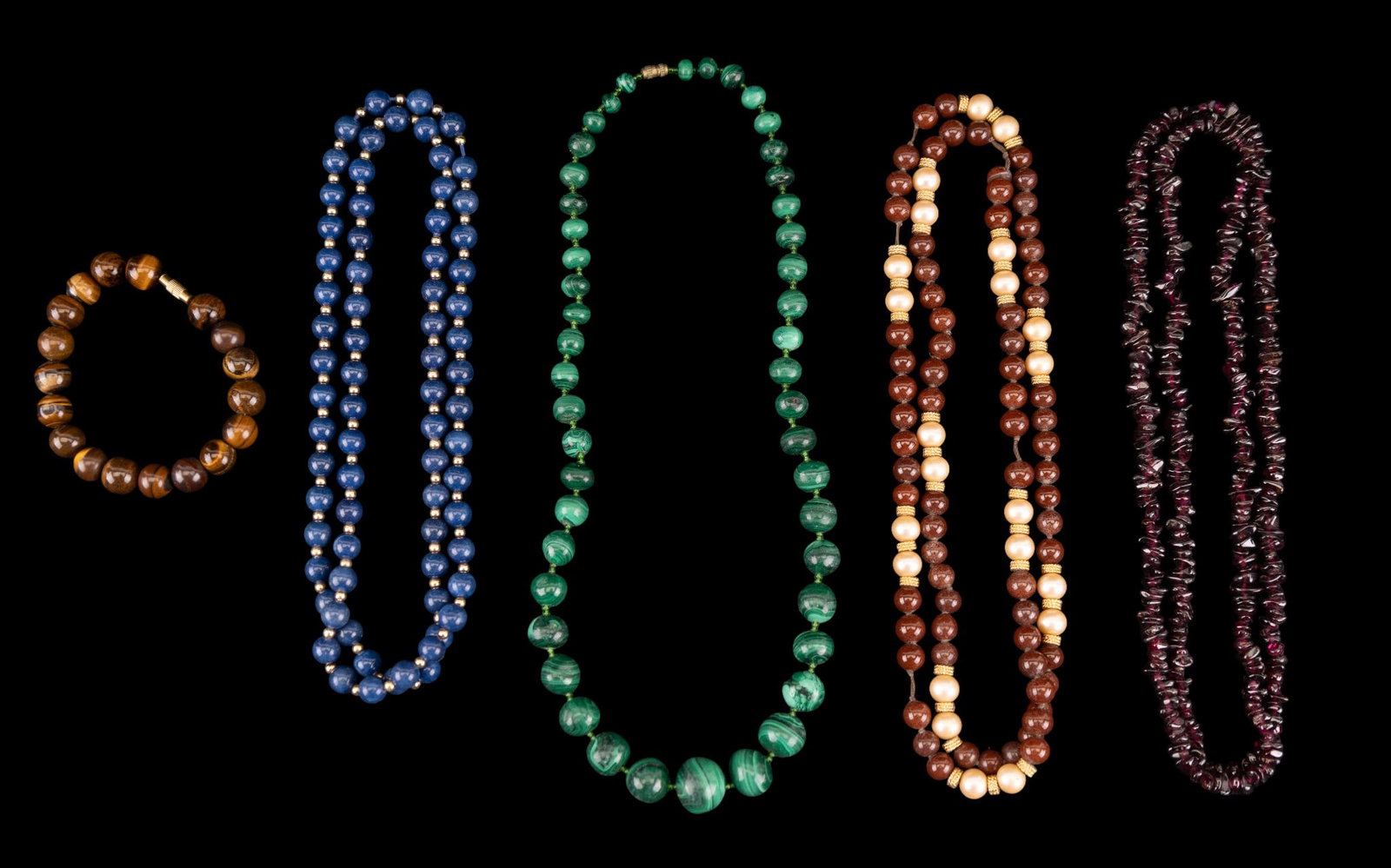 Malachite and Other Necklaces: Polished malachite necklace, lapis necklace with gold spacer beads, garnet and more