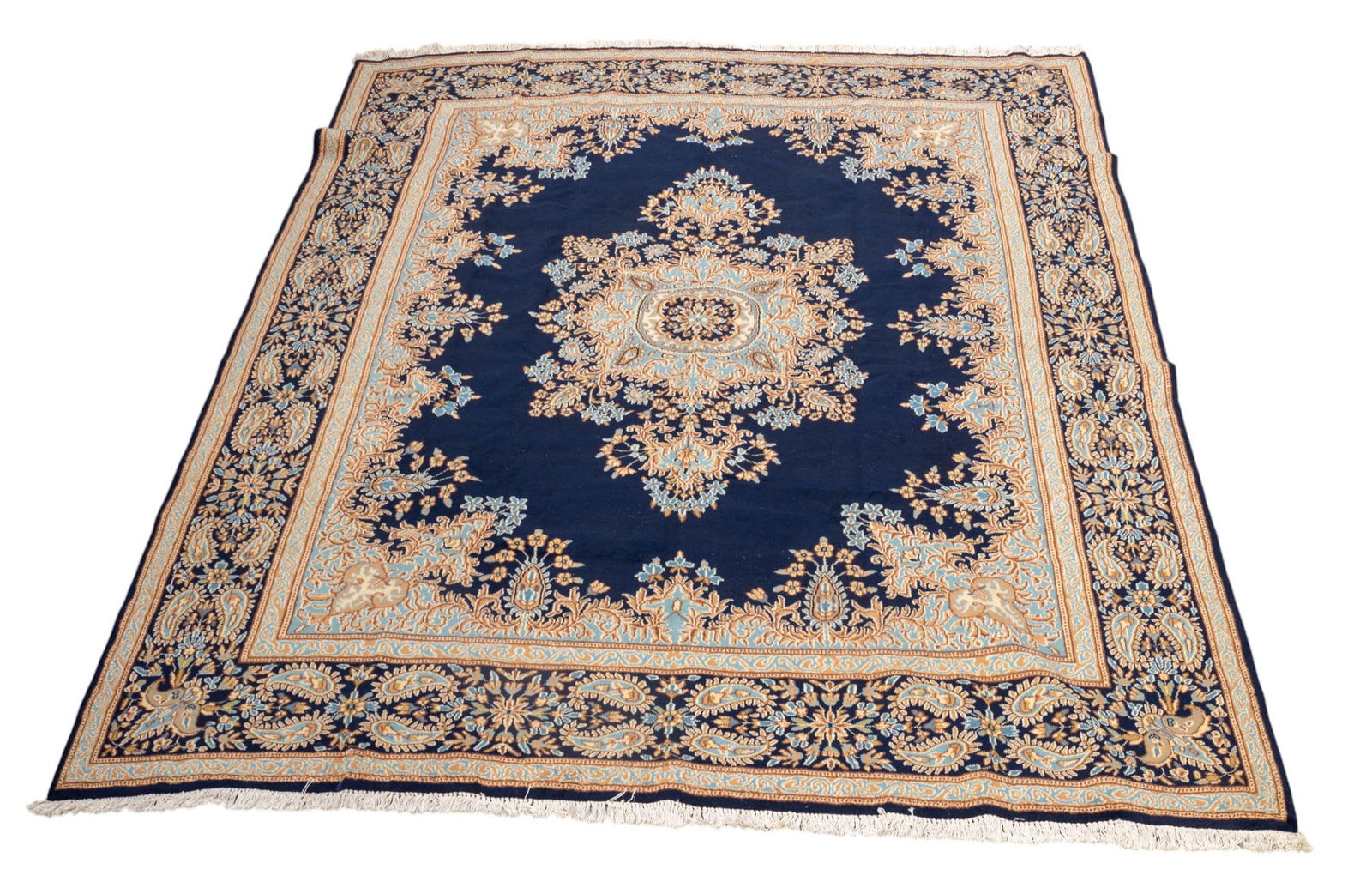 Persian Kerman Rug ~10'x13.25': Persian Kerman rug approx. 10' x 13'4" w/ navy blue, livid blue-gray, brown, tan, & ivory patterns w/ floral motifs. *All rugs / carpets are used & come from fine estates. Keystone Auctions does not c
