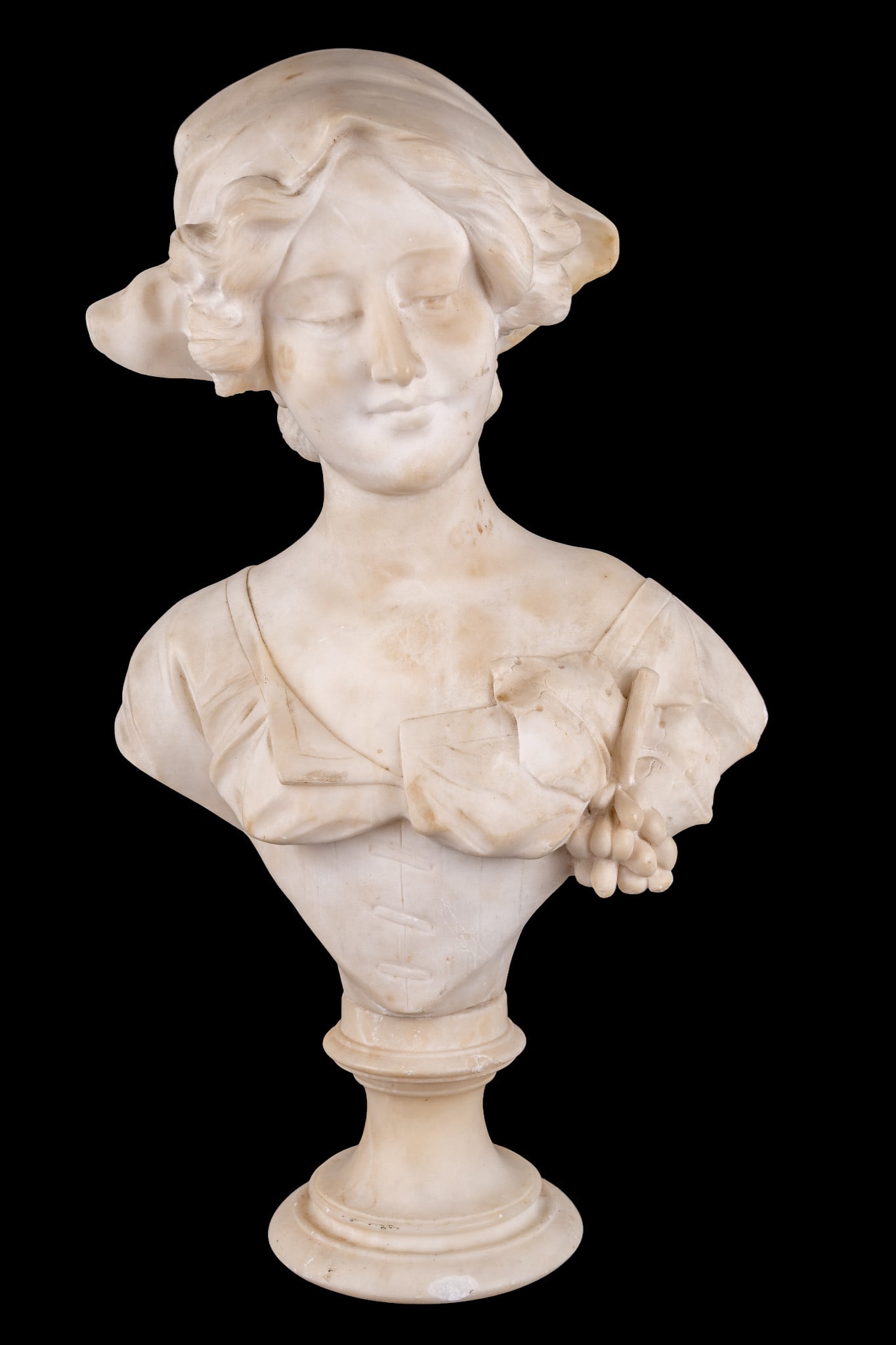 Galli Signed Marble Bust of Woman: Marble bust of a young woman wearing a draped garment and scarf. Signed on reverse "A. Galli". Measures approx. 18" H (with detachable base). Weighs approx. 22 lbs. Base has several chips to marble.