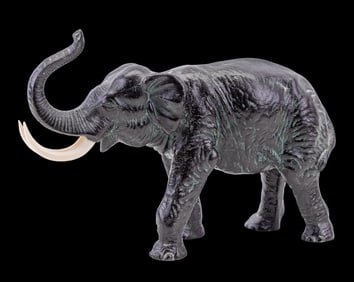 Bronze Elephant with Natural Material Tusks