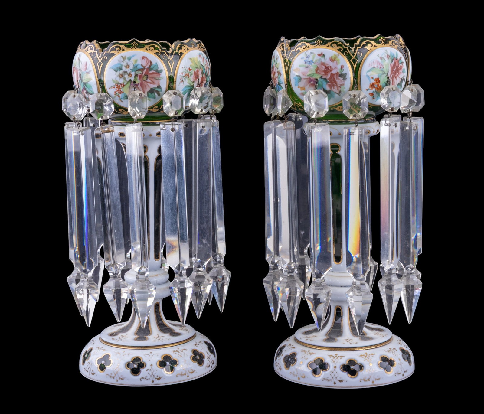 Pair of Bohemian Glass Mantle Lusters: Pair of Bohemian mantle lusters, each fitted with multiple long cut-glass prism drops and matching bases. Measures approx. 13" each.