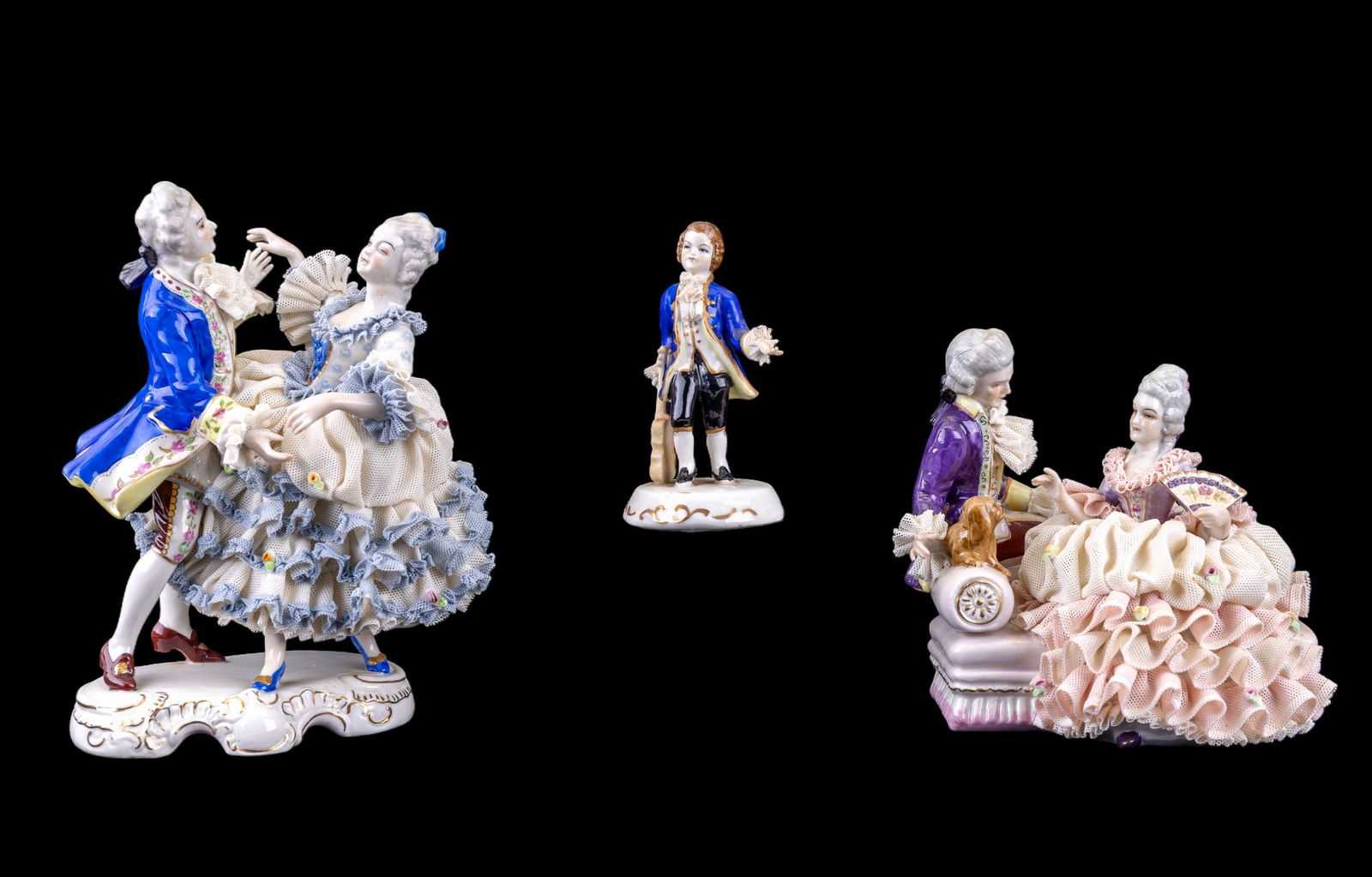 Capodimonte Porcelain Figurines: Lot includes a group of Capodimonte porcelain figural pieces. Largest example measures approx. 10.5" H.