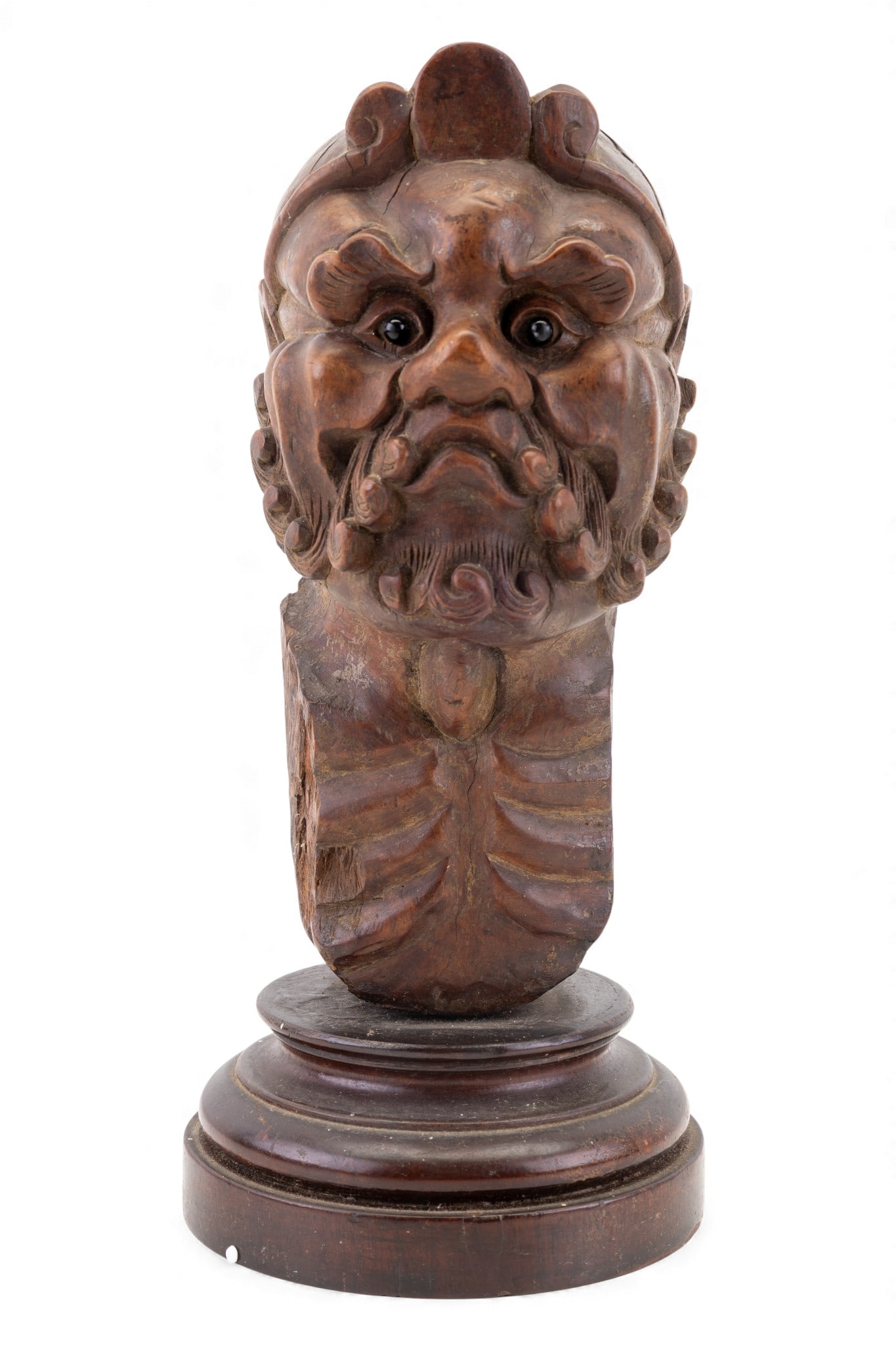 18/19C Hardwood Warrior Bust: 18/19th century Chinese/Japanese warrior bust with glass eyes, mounted onto a circular base. Measures approx. 10" H.