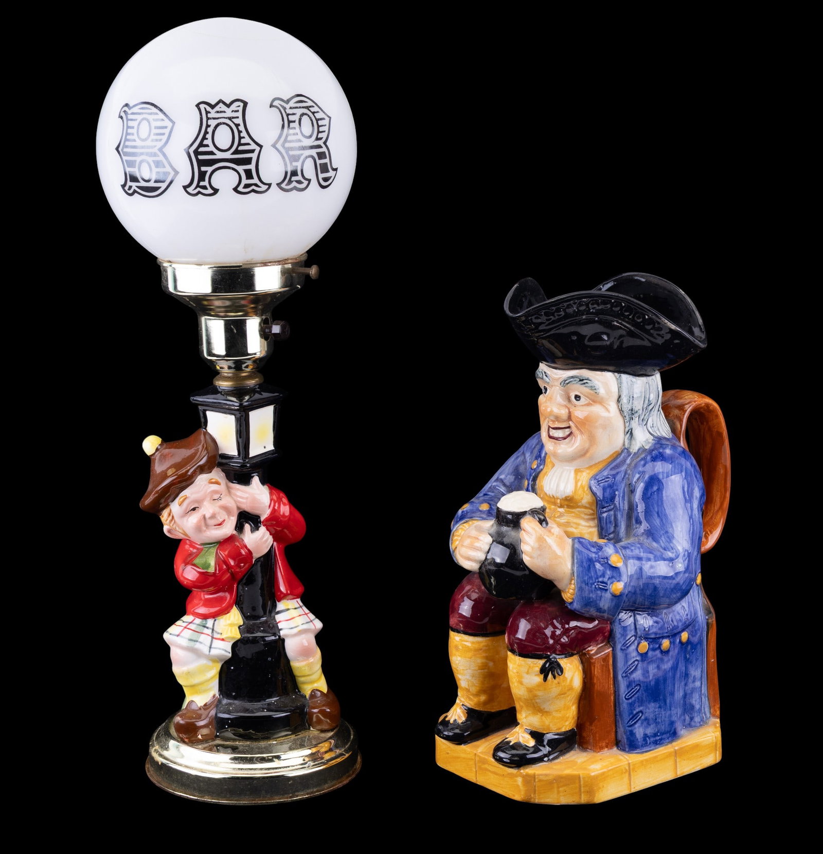 William Kent Toby Jug and Scotsman Light Post Lamp: A vintage ceramic 'Drunk Scotsman' bar light post table lamp, untested, measures approx. 18" H, and a Shorter William Kent 'Squire' Fillpot toby jug, measures approx. 12" H.