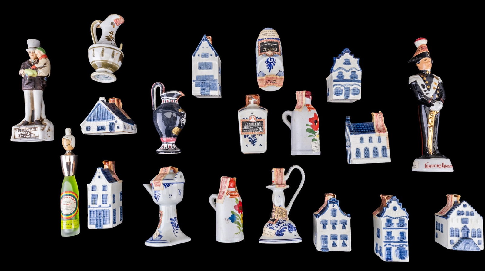 Estate Liquor Figural Mini Bottles: Assortment of approx. 23 vintage estate liquor bottles featuring various figural examples.