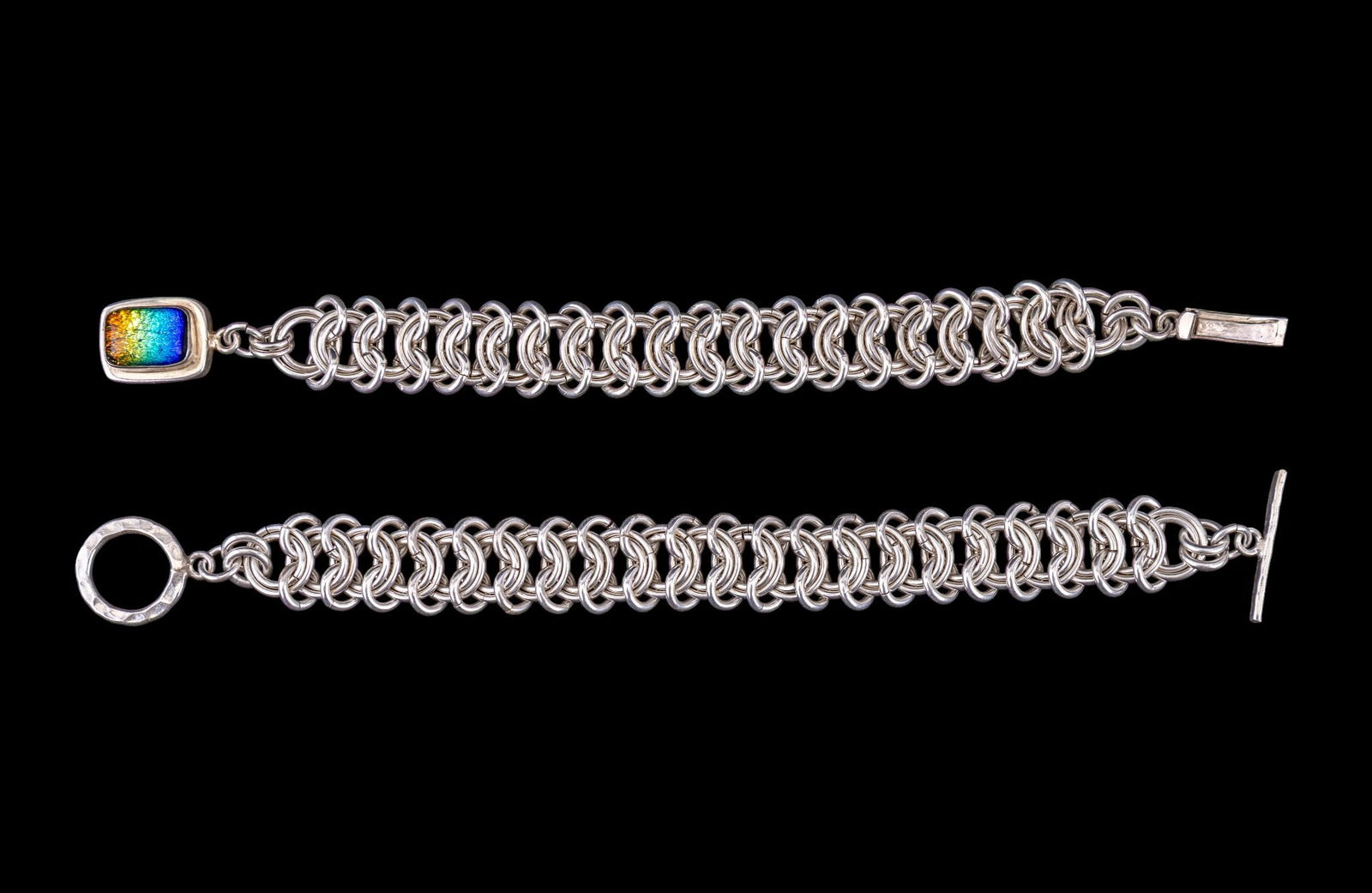 Hand Made Sterling Link Bracelets: A hand made sterling link bracelet with dichroic glass inlay clasp and a matching link bracelet with hammered toggle closure.