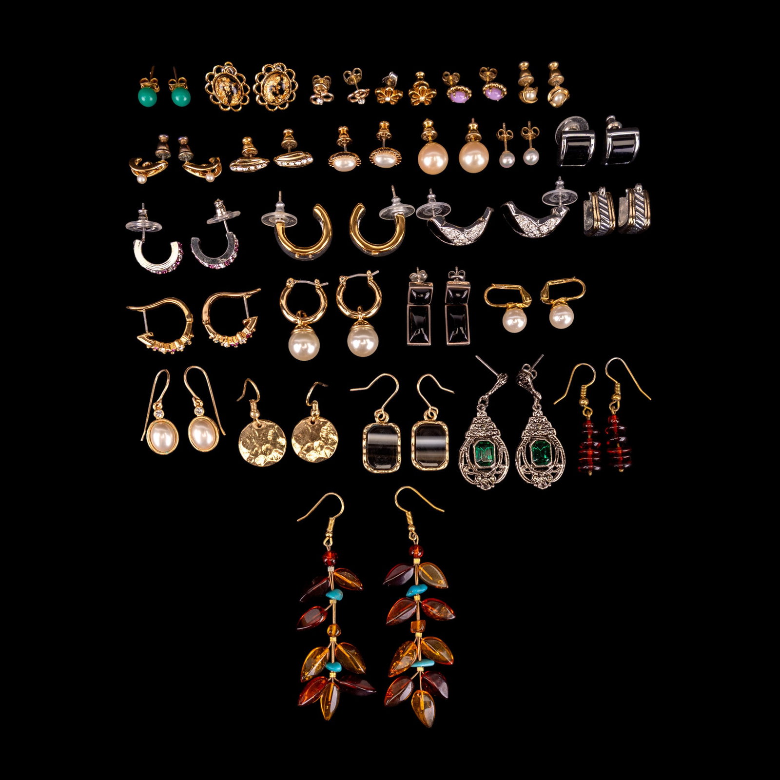 Sterling and Other Designer Costume Earrings: A collection of designer costume earrings featuring Trifari, Ralph Lauren, Napier, Romans, and Liz Claiborne, a pair of sterling and black cabochon dangle stud earrings, gold tone and faux pearl earri