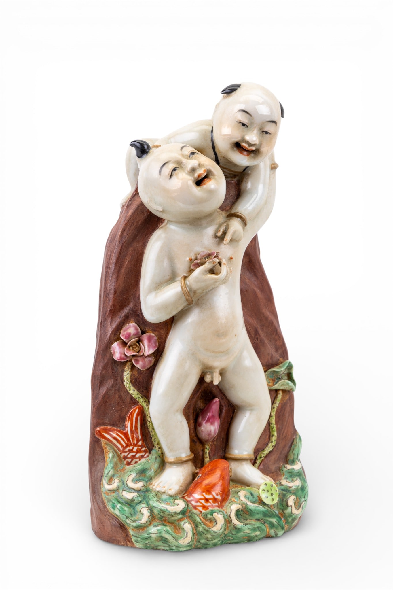 Chinese Porcelain Boy Immortals Figure: An early Chinese porcelain depiction of the "Boy Immortals" or Hehe Erxian. Figure measures approx. 9.75" high. Porcelain in good condition,