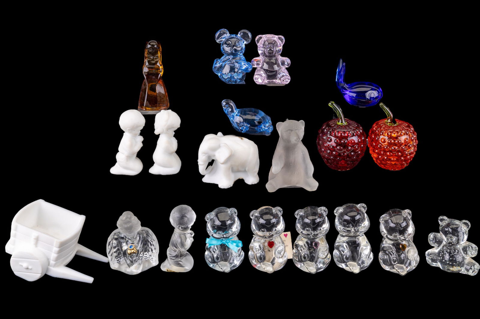 Fenton and Other Glass Paperweights and Figurines: A collection of 20 vintage glass paperweights and figurines featuring various Fenton pieces including a milk matte glass elephant leading a cart, a glass angel, praying children, bears, a Mosser glass