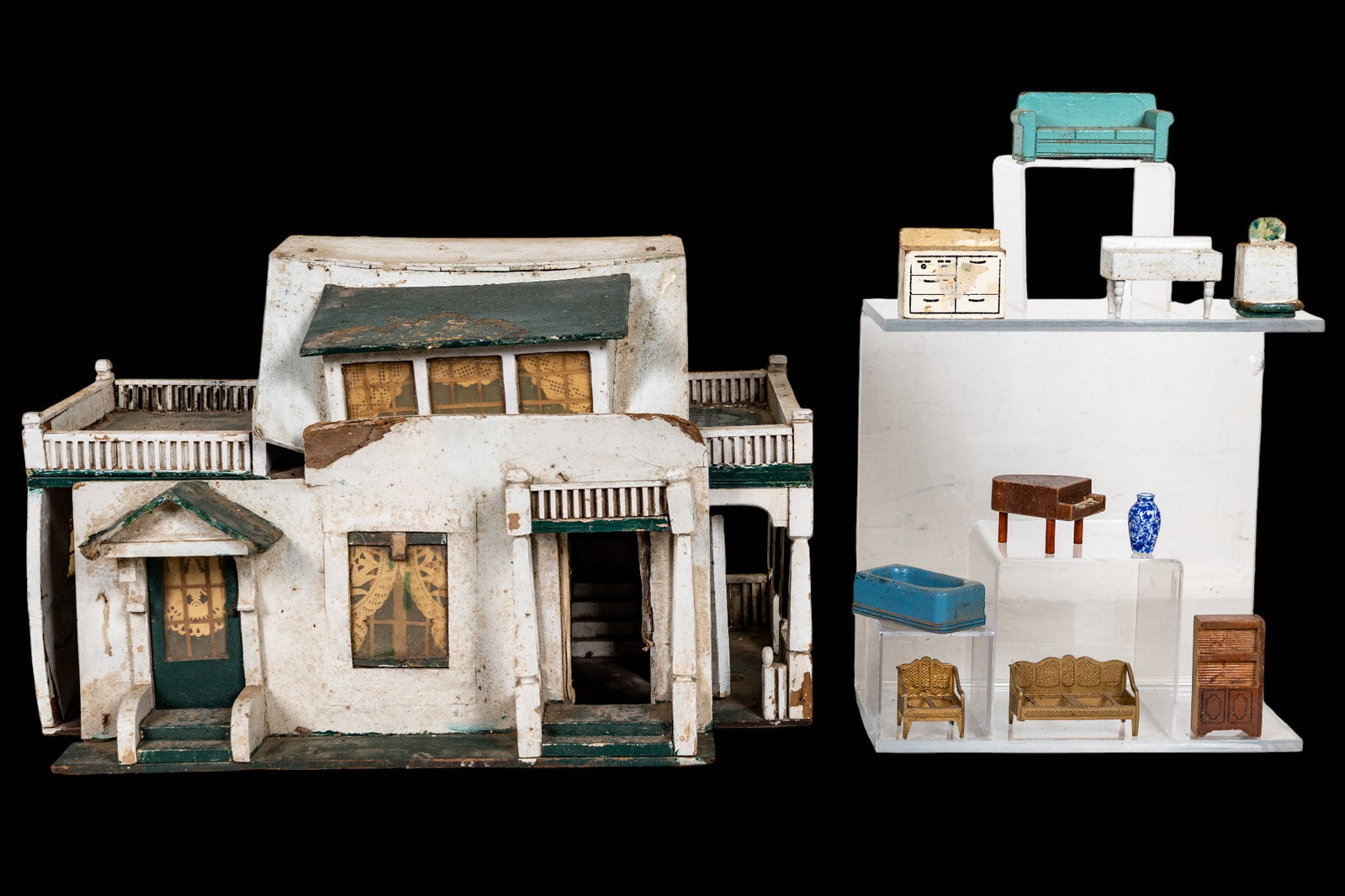 Early 20th Century Doll House and Furniture: Early 20th century doll house and furniture. Dollhouse sold in as found condition. Special pickup/shipped considerations must be made due to size. Measures approx. 14" H x 10.5" W x 15" D.