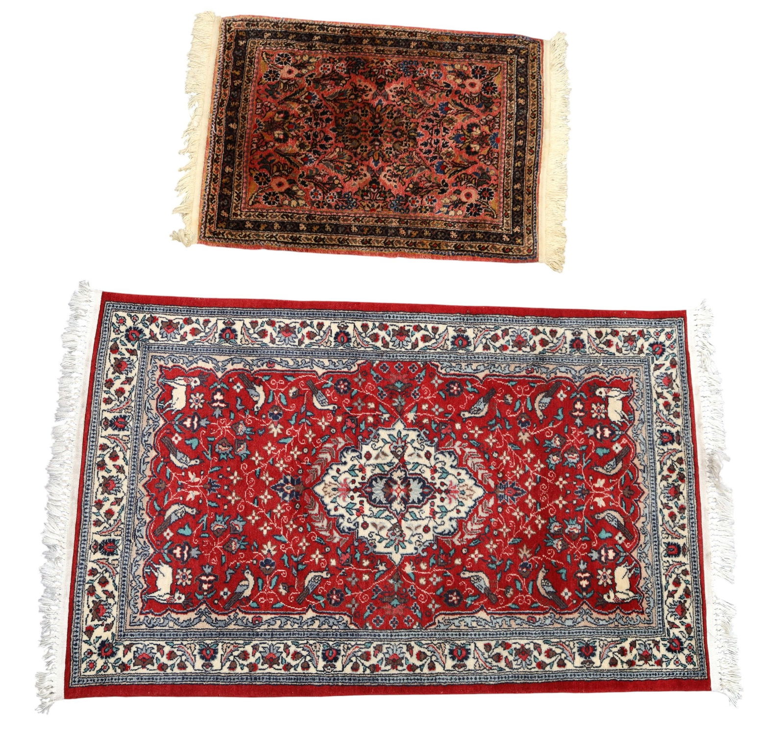 2 Persian Rugs: 2 small hand-woven Persian rugs. Larger measuring approx. 4'4" x 2'7".