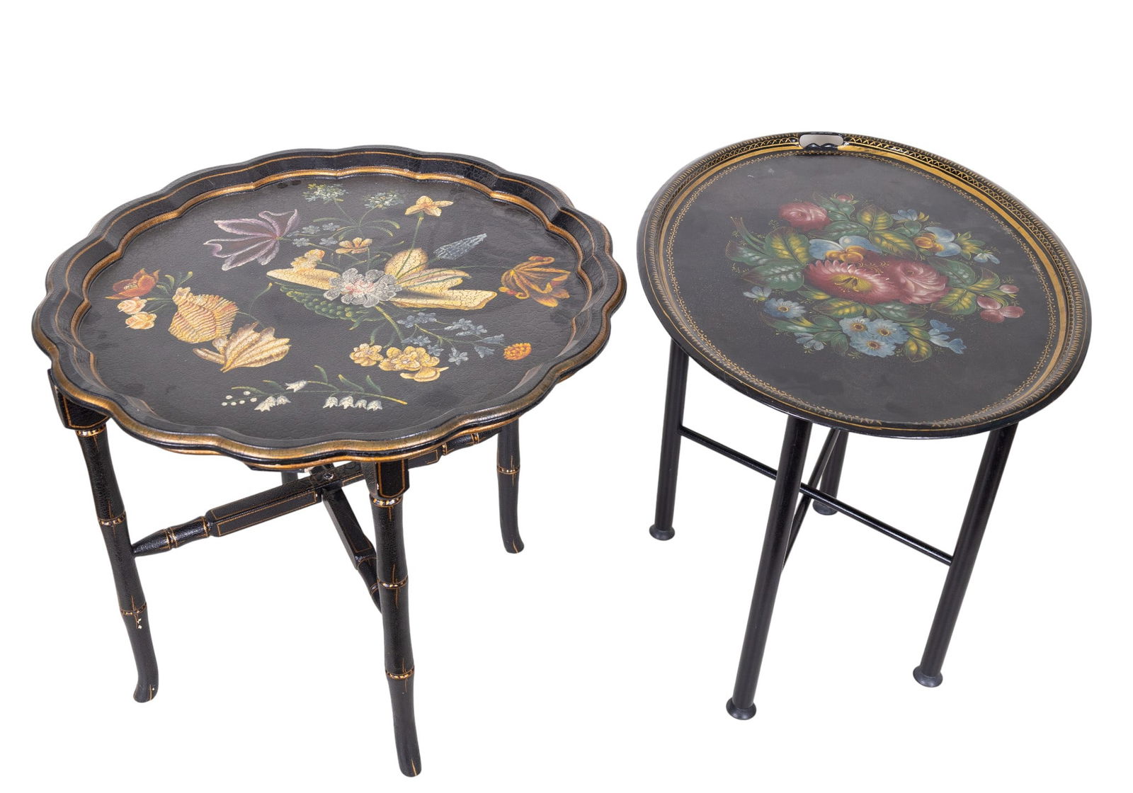 Toll Decorated Trays, One Maitland-Smith: Two toll decorated black lacquer trays eeeeeeeeeee, larger of the two attributed to Maitland-Smith. LArger of the two measures approx. 20.5" high x 24" diameter.