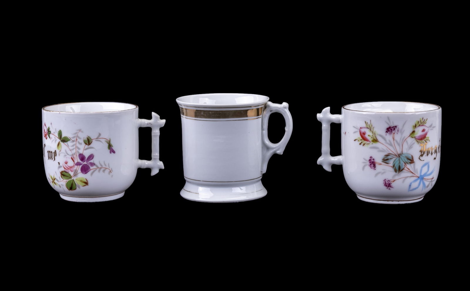 Antique German Porcelain Mustache Mugs: Two antique hand painted German porcelain mustache mugs with gold lettering and rim accents, and a vintage porcelain shaving mug.