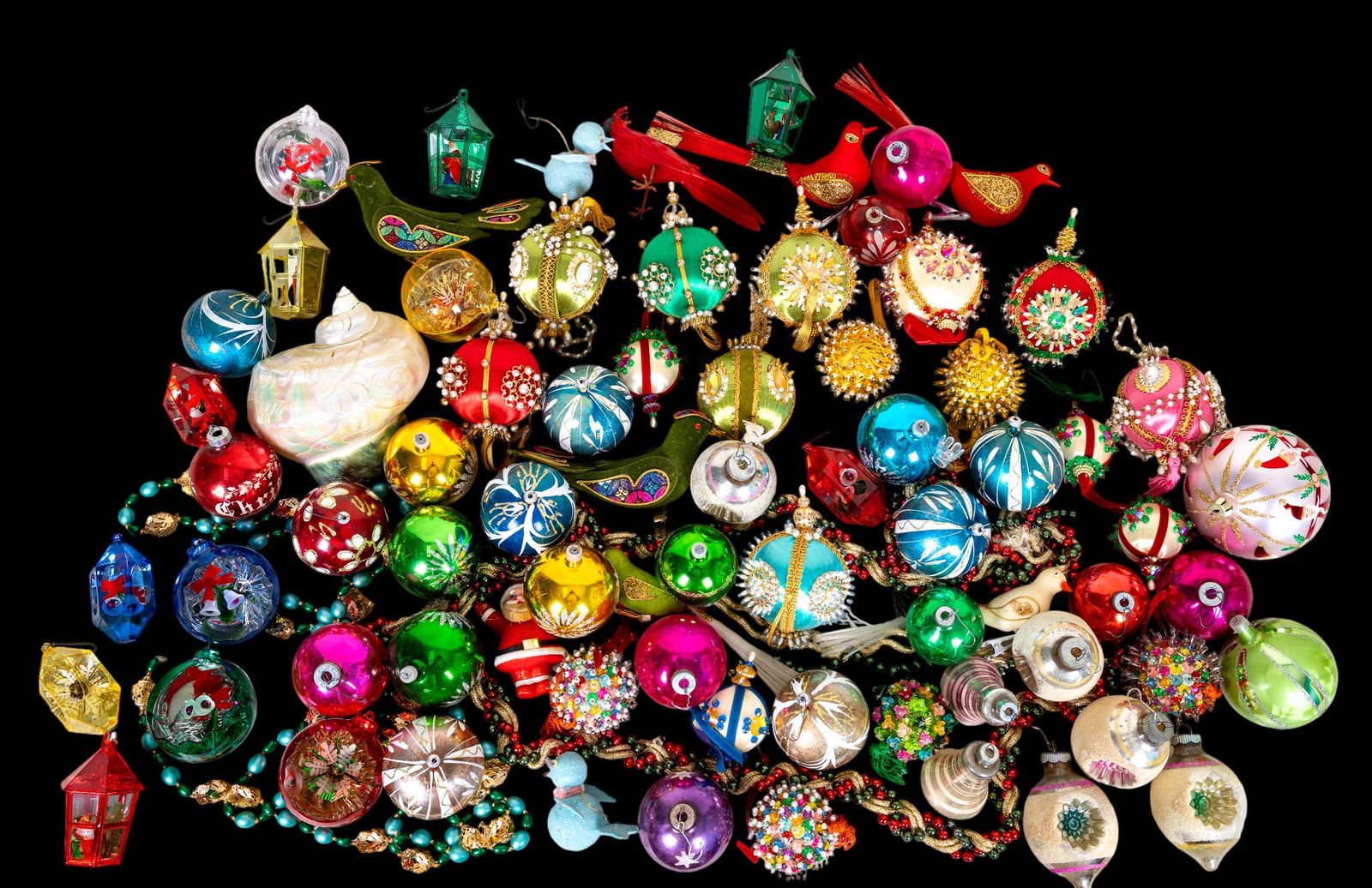 Vintage Christmas Ornaments: A collection of vintage blown glass ornaments, beaded ornaments, bead garland, clip on birds, and more.