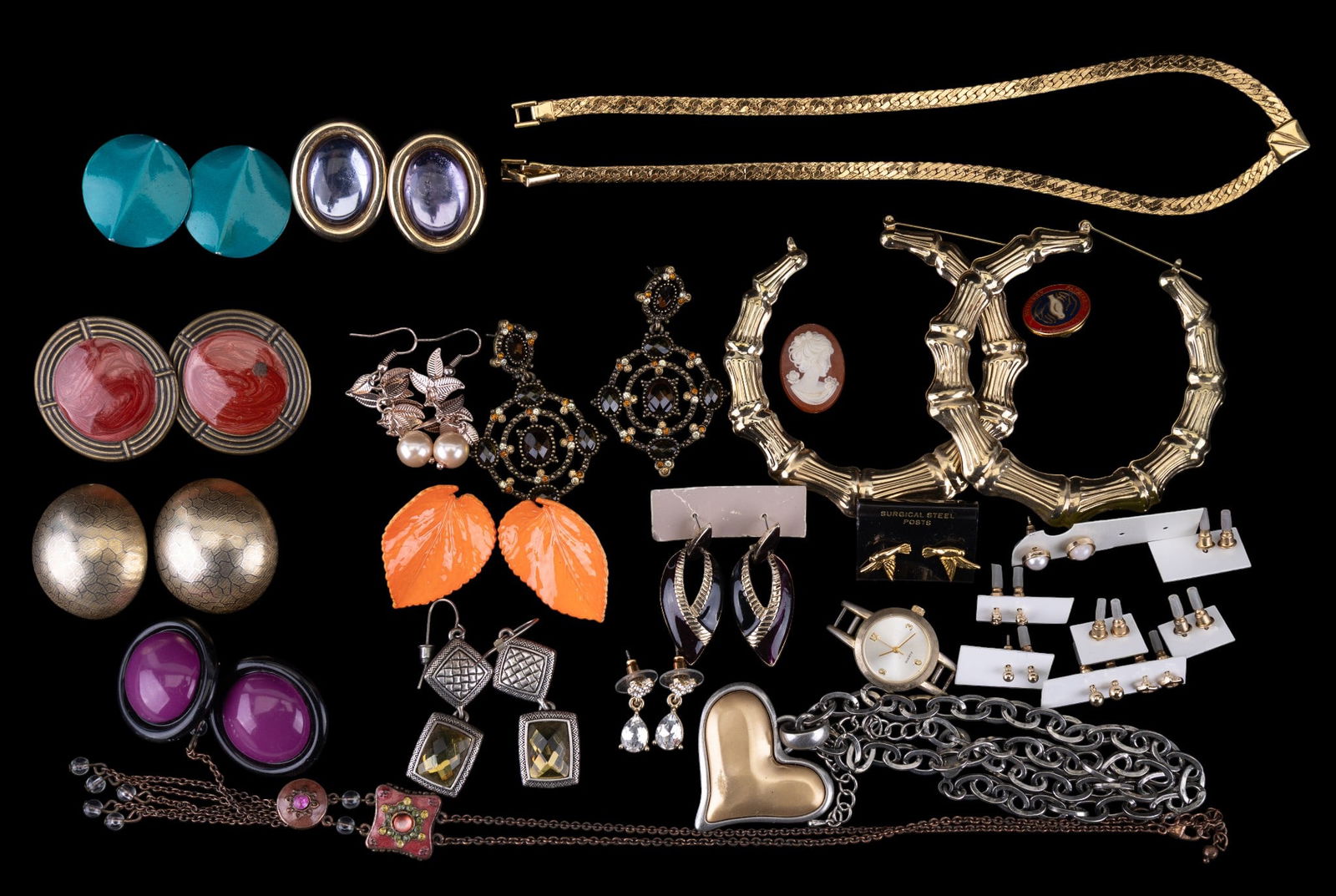 Costume Jewelry Earrings, Necklaces, more: Many pairs of costume jewelry earrings with enamel, rhinestones and figural design, along with a copper enamel necklace, gold tone chain necklace, and more.