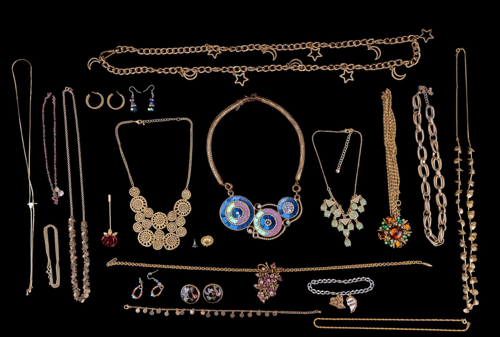 Vintage, Art, Gold Tone Costume & more: A vintage gold tone necklace with Art amber hue pendant, gold tone enamel earrings, a glass beaded rosary, crystal drop earrings, gold tone rhinestone statement necklace, gold tone rose stick pin, lea