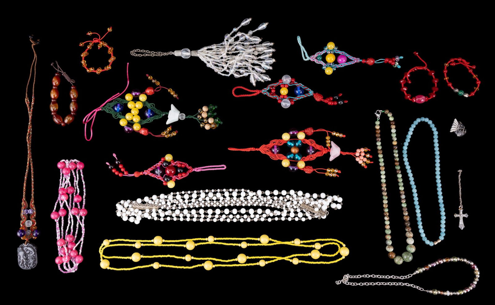 Natural Stone & Colorful Glass Beaded Jewelry: Grouping of natural stone and colorful glass beaded jewelry including a multi-stranded white bead necklace, faceted crystal bead bracelets, blue beaded necklace, multiple handmade charms, amber hue gl