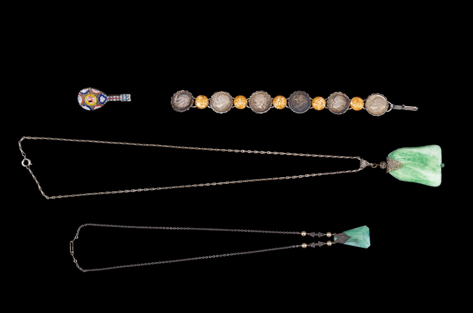 Art Deco and Other Jewelry: A German Art Deco necklace with pearl accents and glass pendant, an Art Deco necklace with white and green glass pendant, an Italian mosaic brooch, and a mid century dime bracelet, dimes dated 1964. L