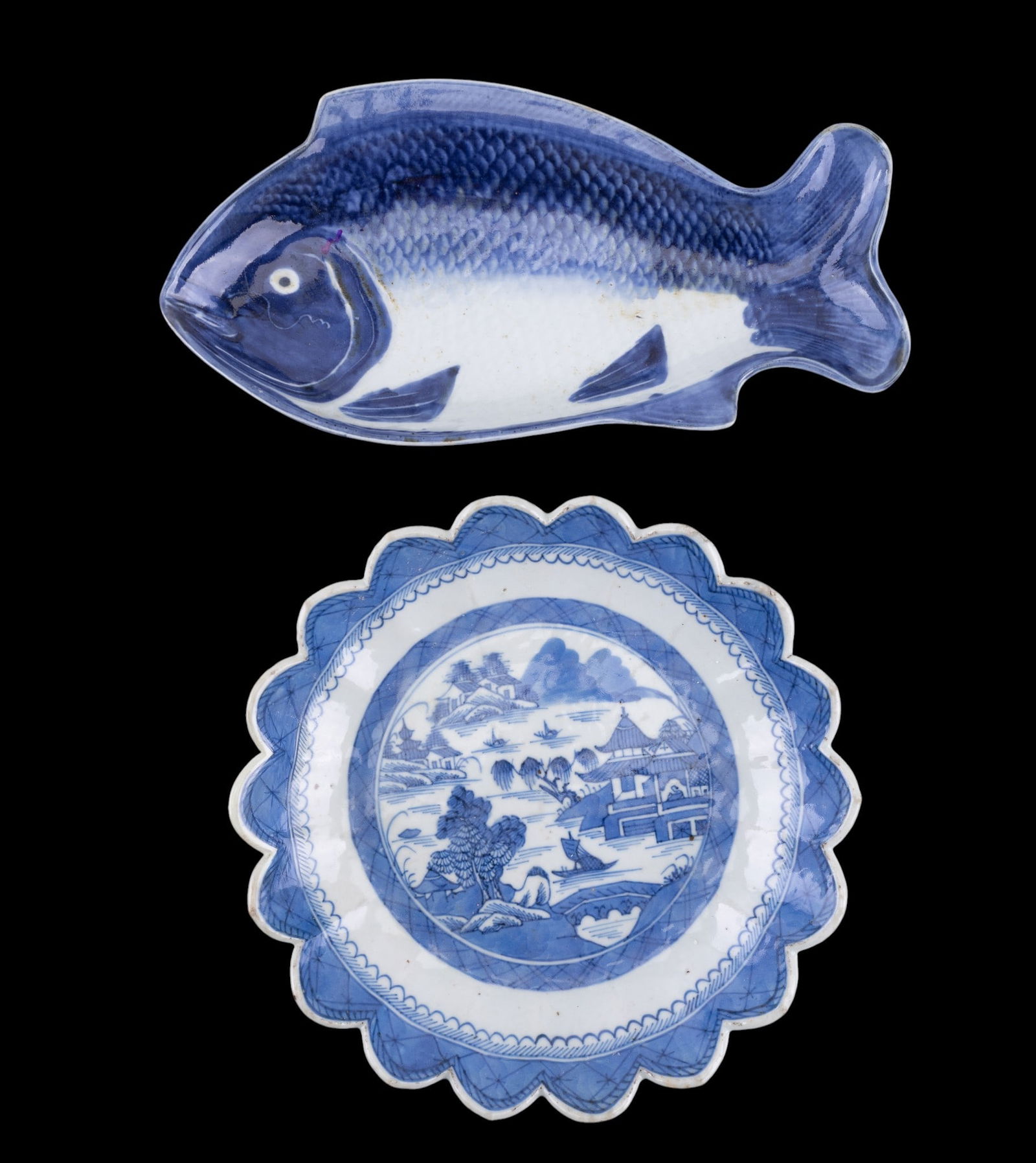18th C Japanese Arita Fish and Chinese Canton Dish: An 18th C Meiji Japanese Arita blue and white porcelain fish tray, note four-character mark and hairline on the bottom, and glaze slip on the underside of the back fin, measures approx. 10" W x 5" D x
